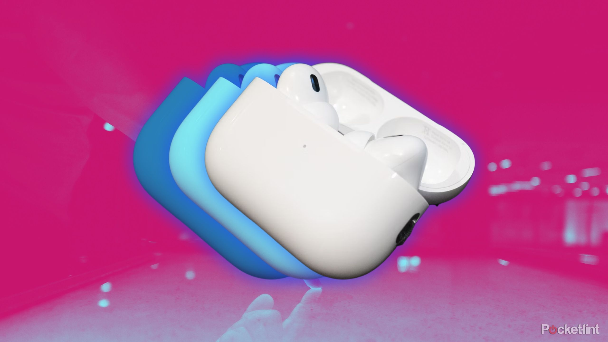 Apple's USB-C AirPods Pro 2nd-generation against a pink background. 