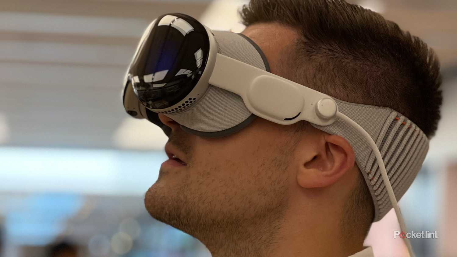 Wearing a Vision Pro headset at an Apple Store. 