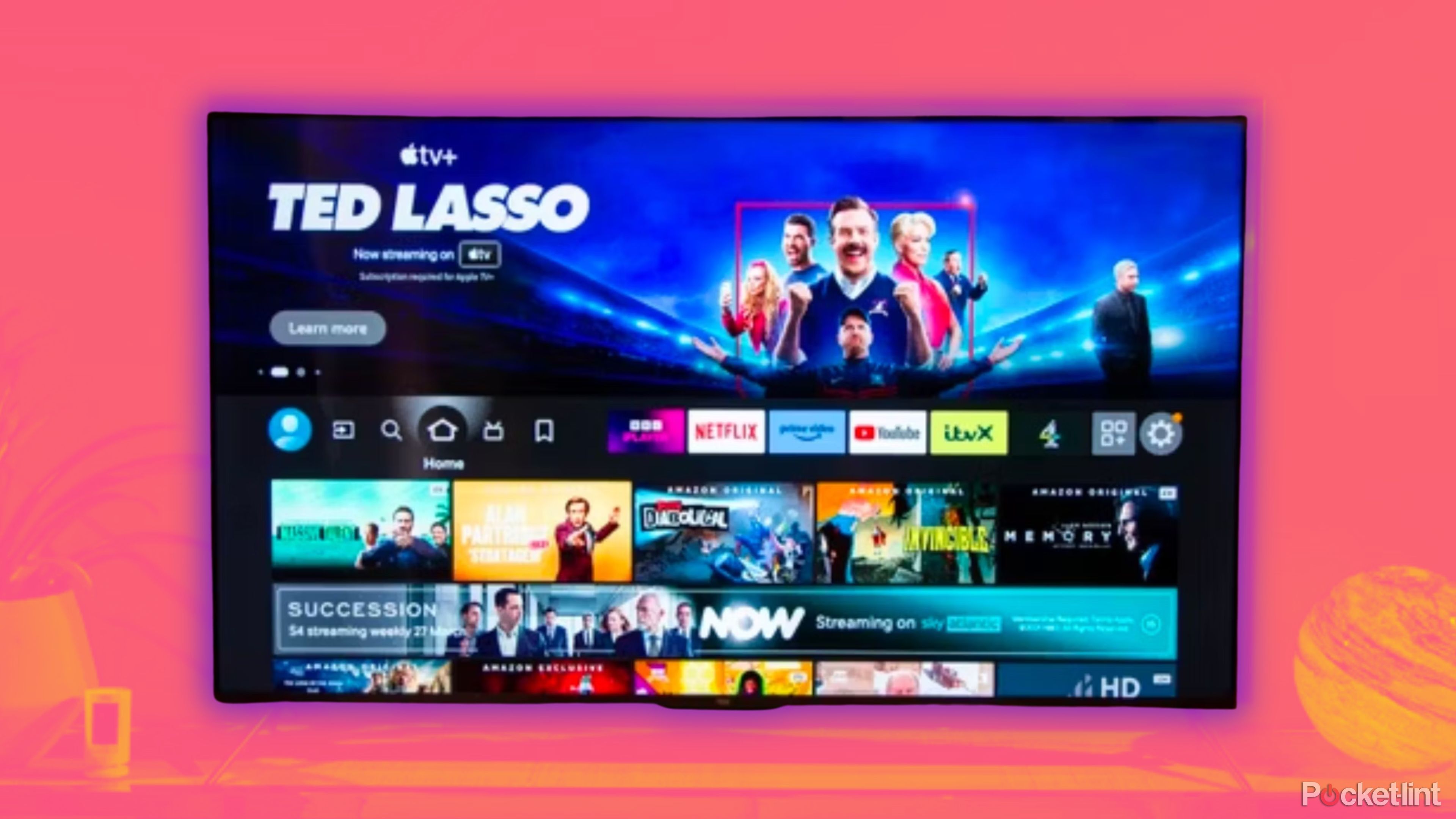 QLED screen with Ted Lasso on it.  