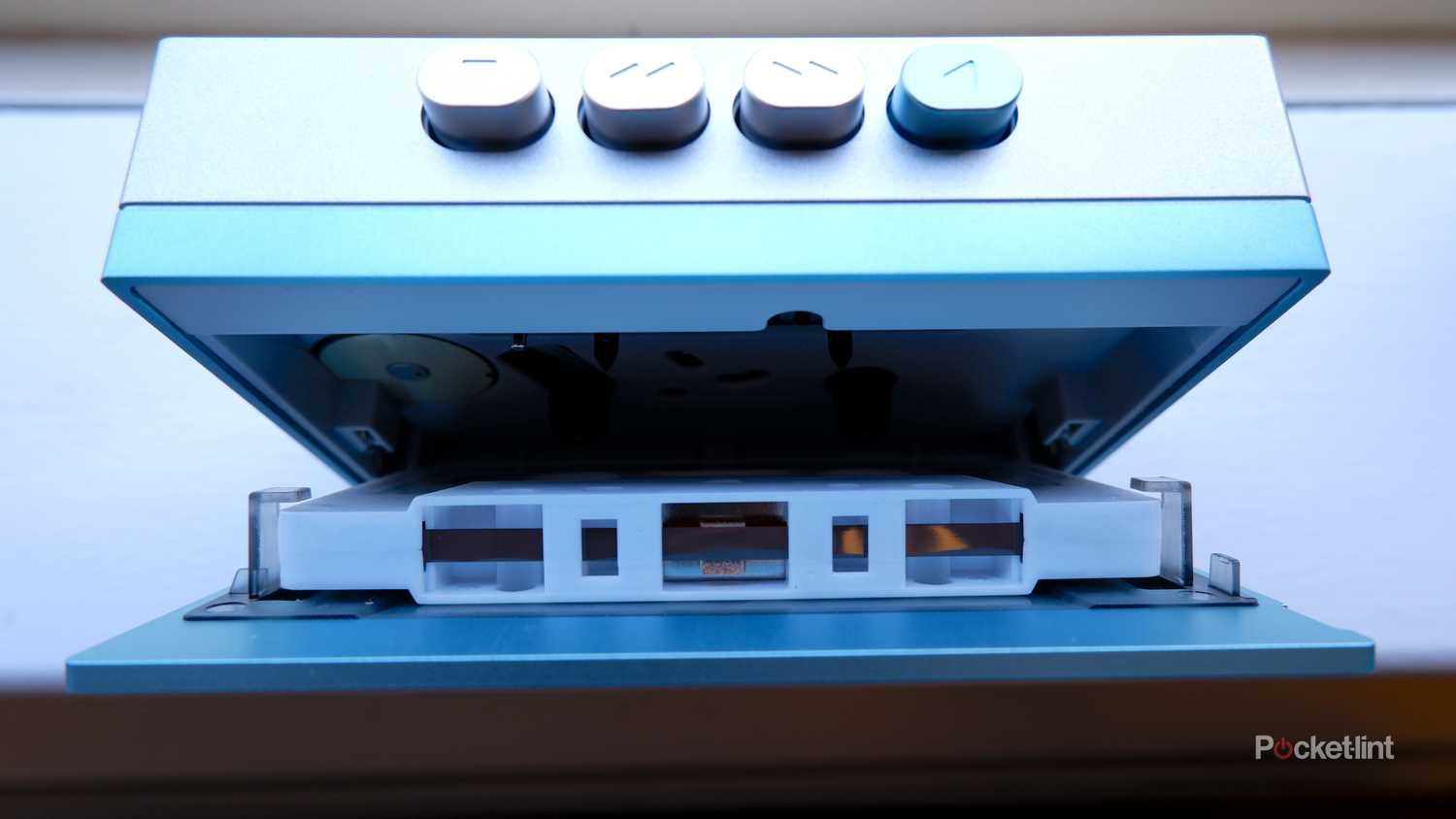 The inside of the Fiio CP13 cassette player from above, with a tape inserted into the player.