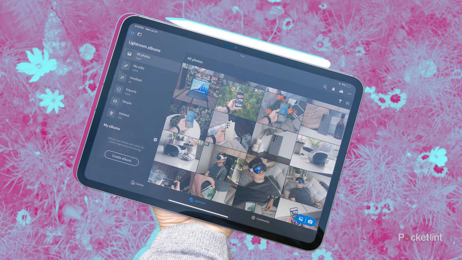 A hand holding an M4 iPad Pro with nano-texture glass.