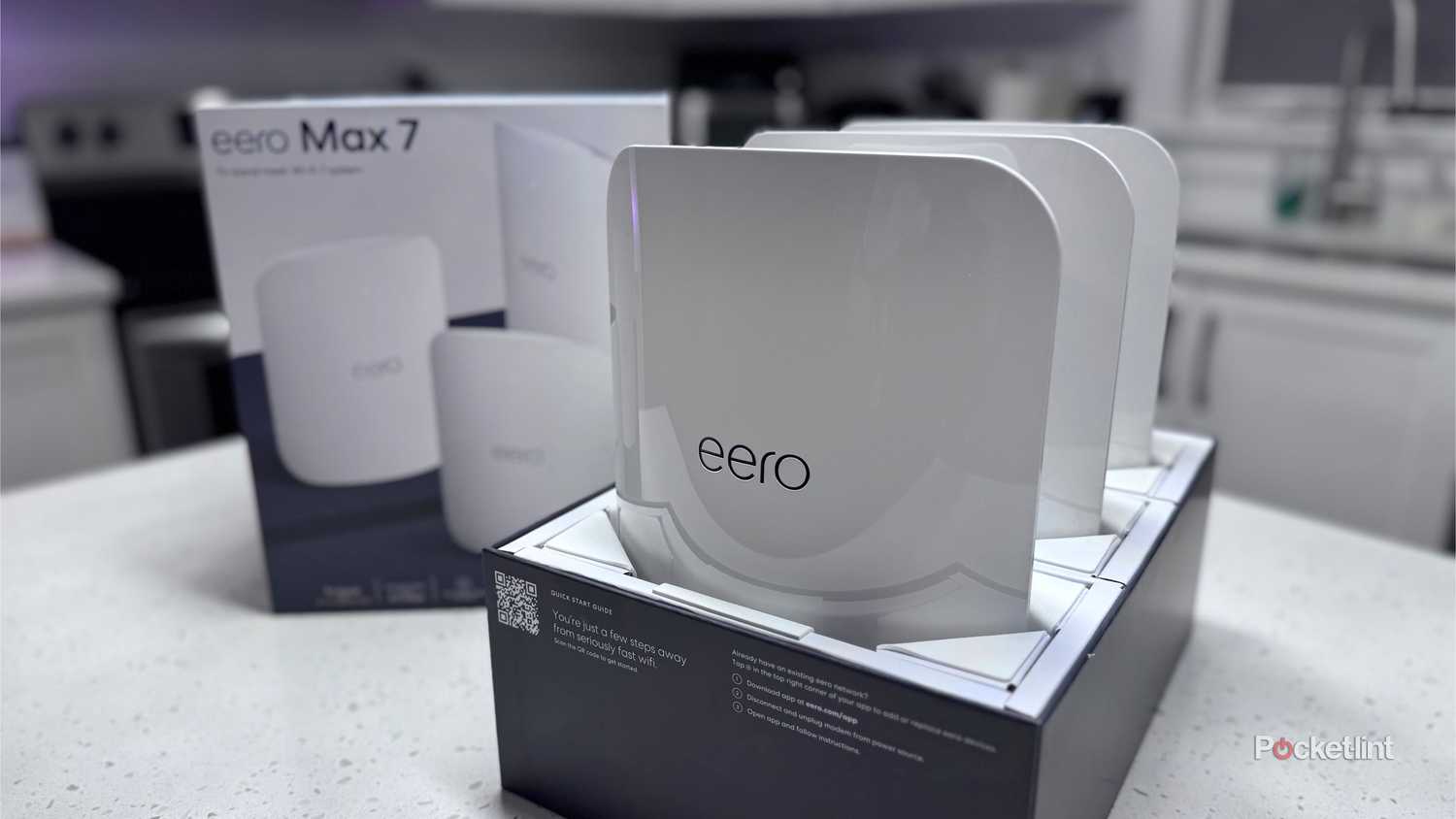 An Eero Max 7 three-pack partially unboxed.