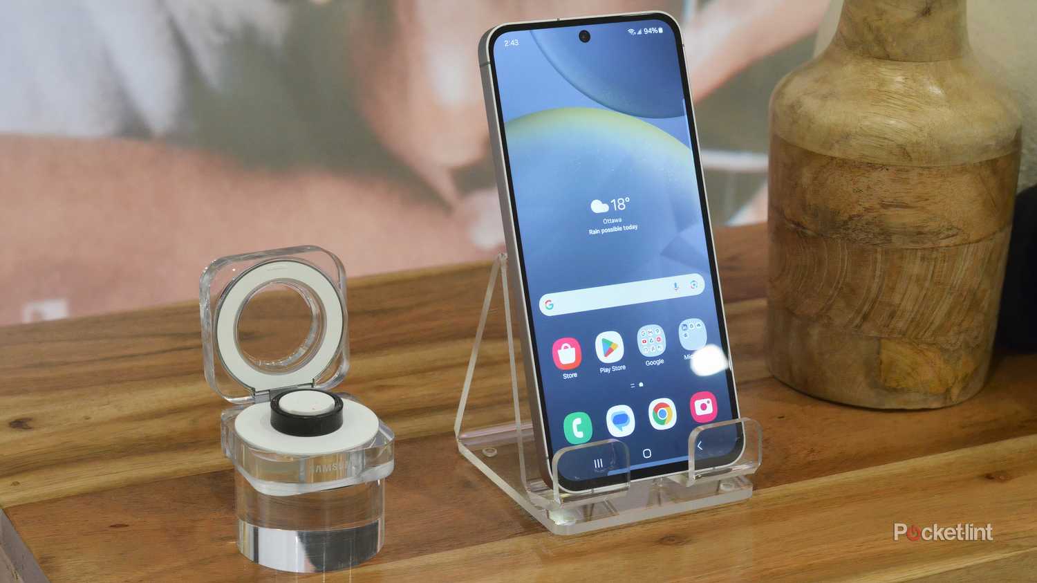Galaxy S24 FE on display next to Galaxy Ring. 