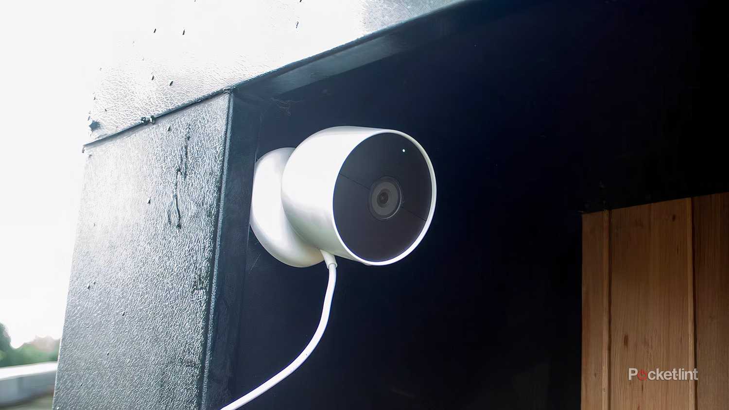 The Google Nest Cam battery outside with a wire