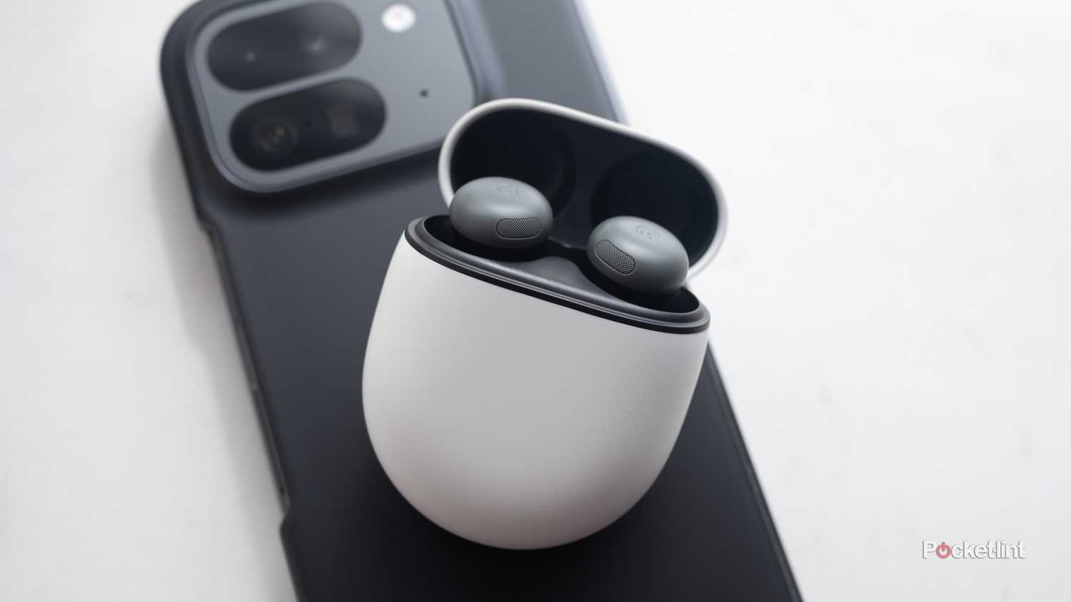 The Pixel Buds Pro 2 sitting on the Pixel 9 Pro Fold.