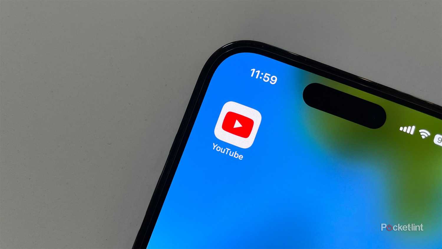 The YouTube app icon on an iPhone.