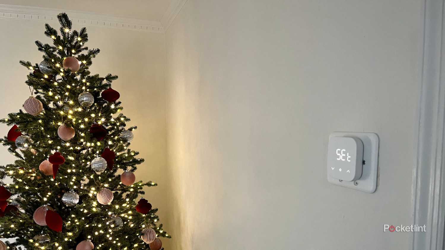 amazon smart thermostat in a room with a christmas tree