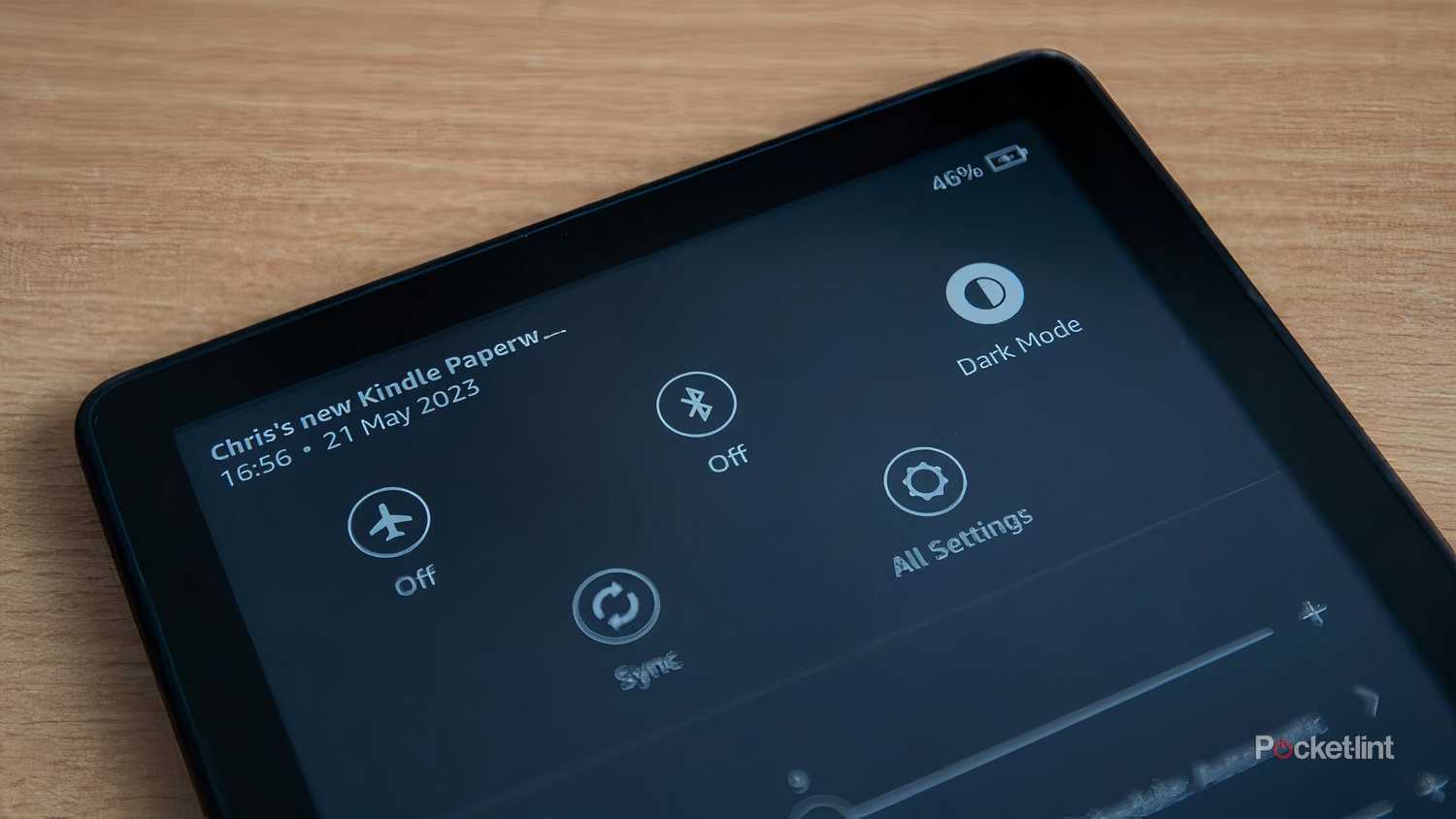 A Kindle Paperwhite in Dark Mode with its colors inverted.