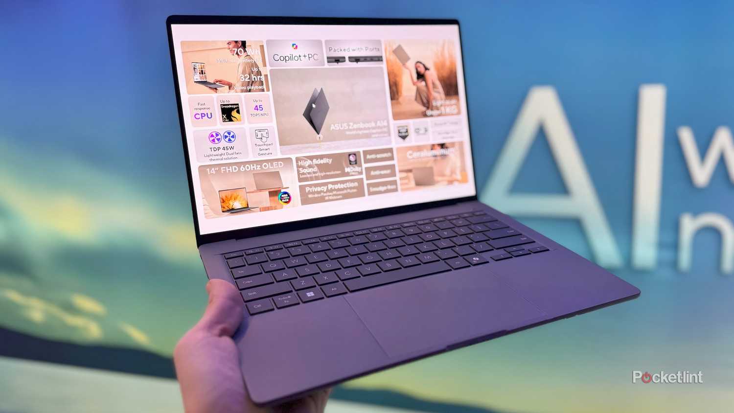 Zenbook A14 in hand. 