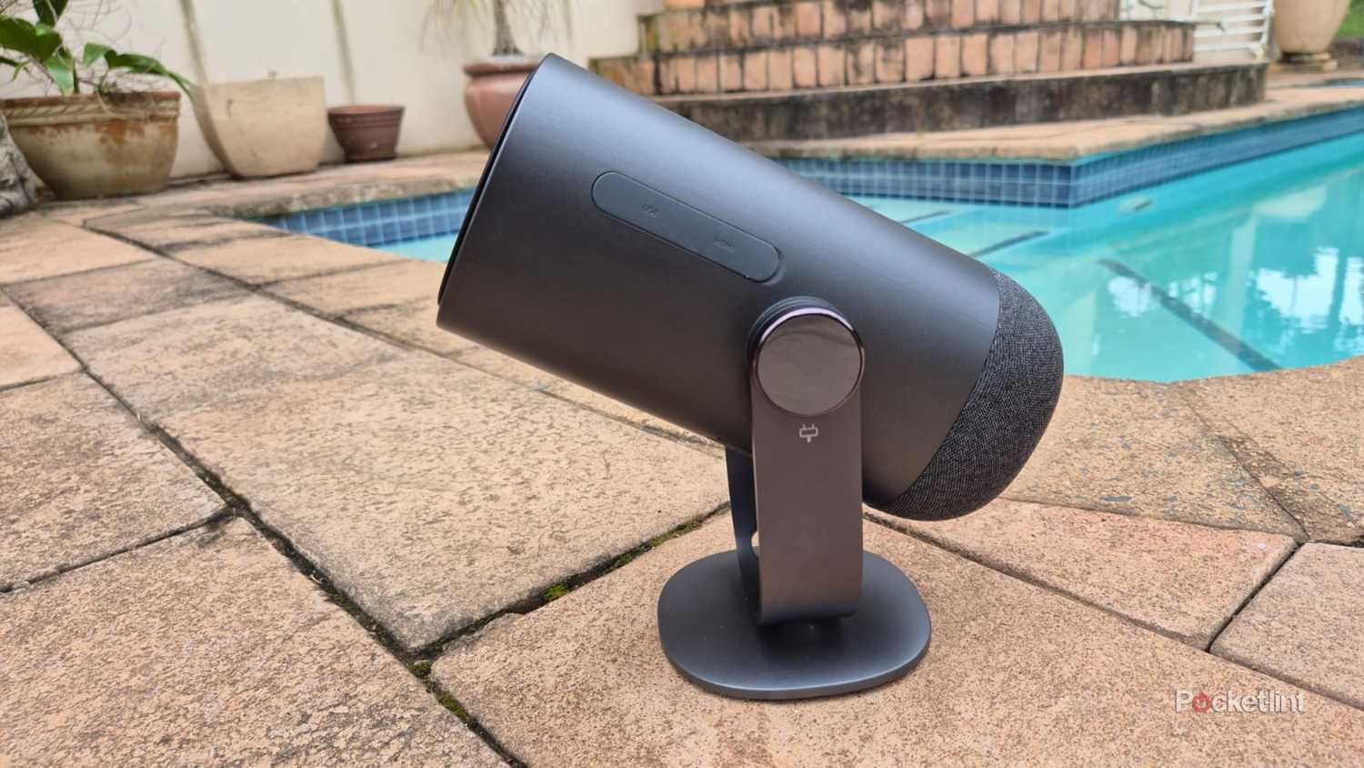 Dangbei Freedo beside a pool side. 