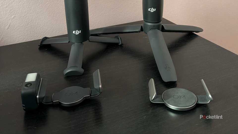 DJI Osmo Mobile 7P next to Osmo Mobile 6 with their stands. 