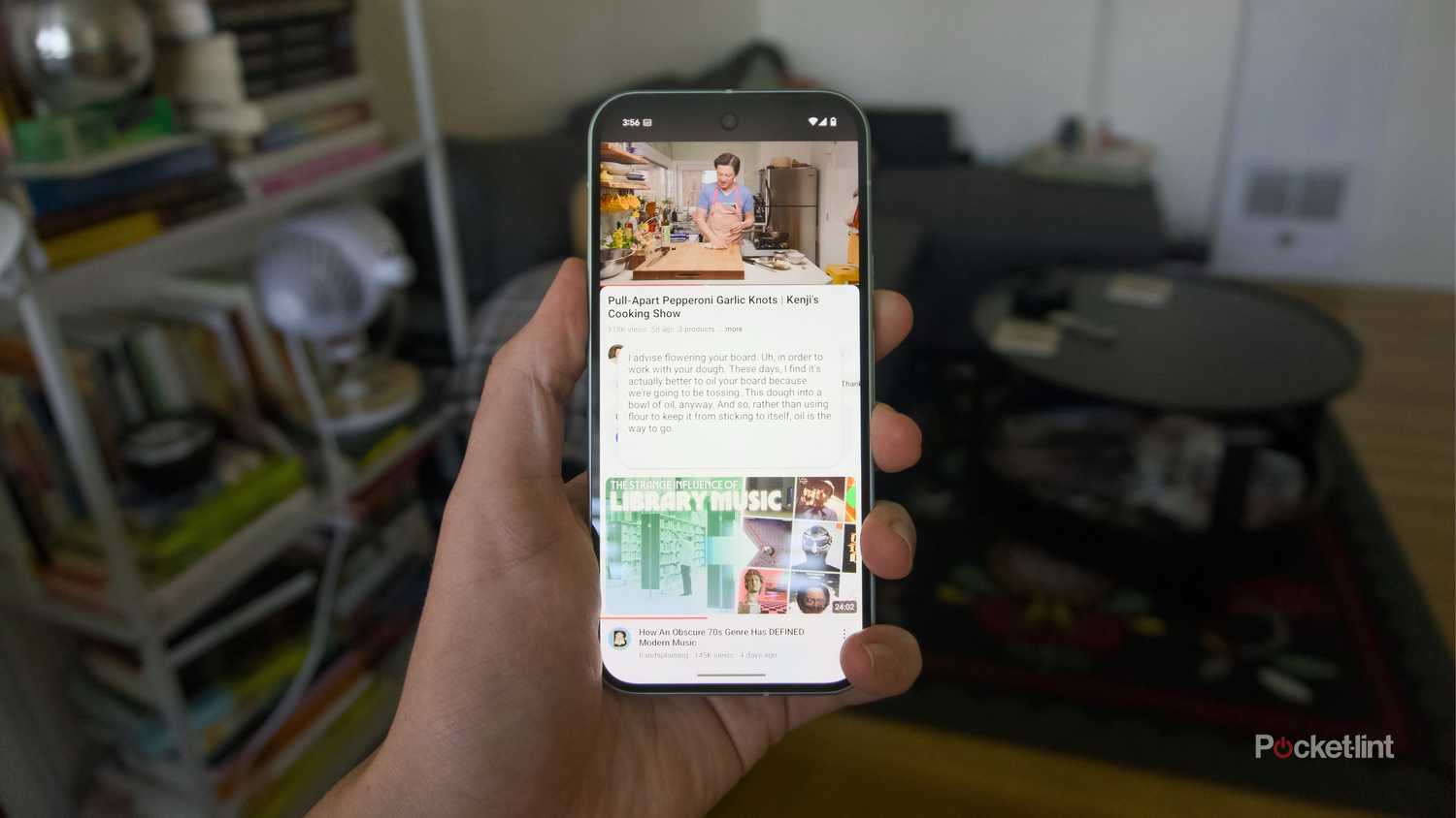 Live captions under a YouTube video on a Pixel 9.
