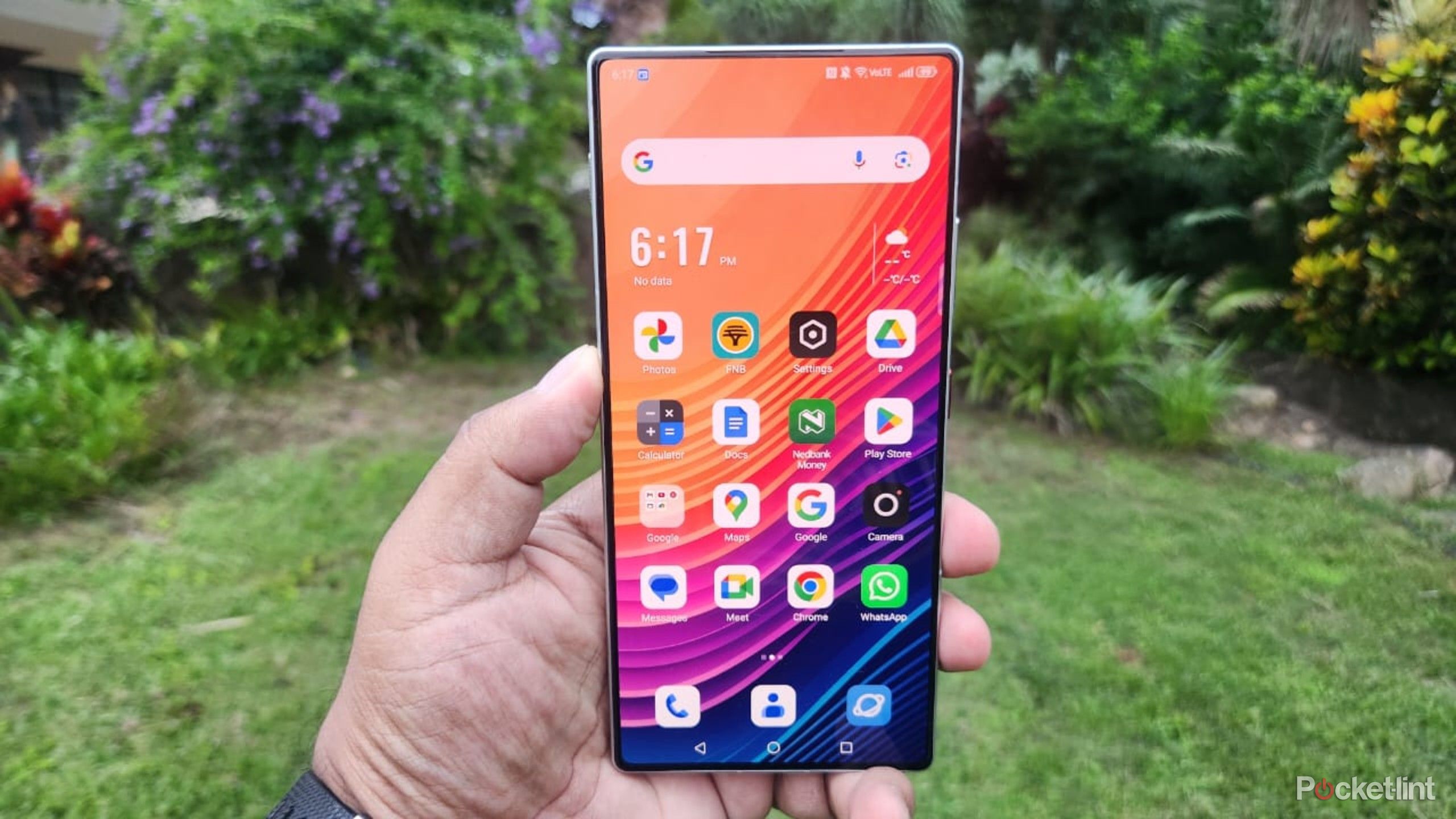 Nubia Z70 in a garden. 