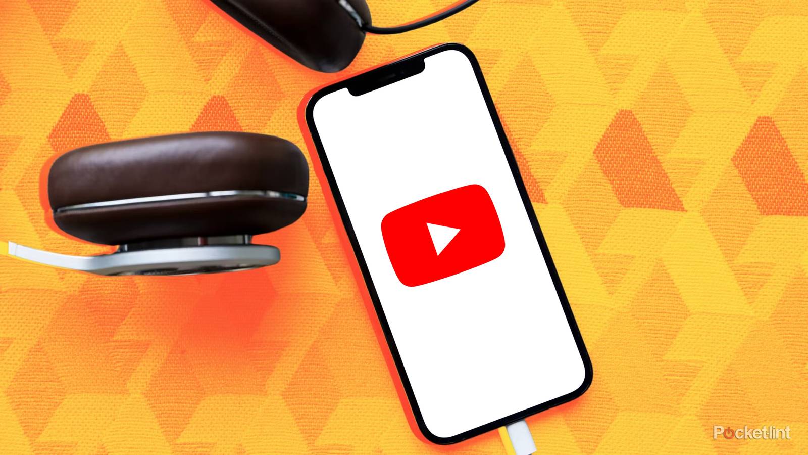 YouTube on iPhone with headphones on yellow background.