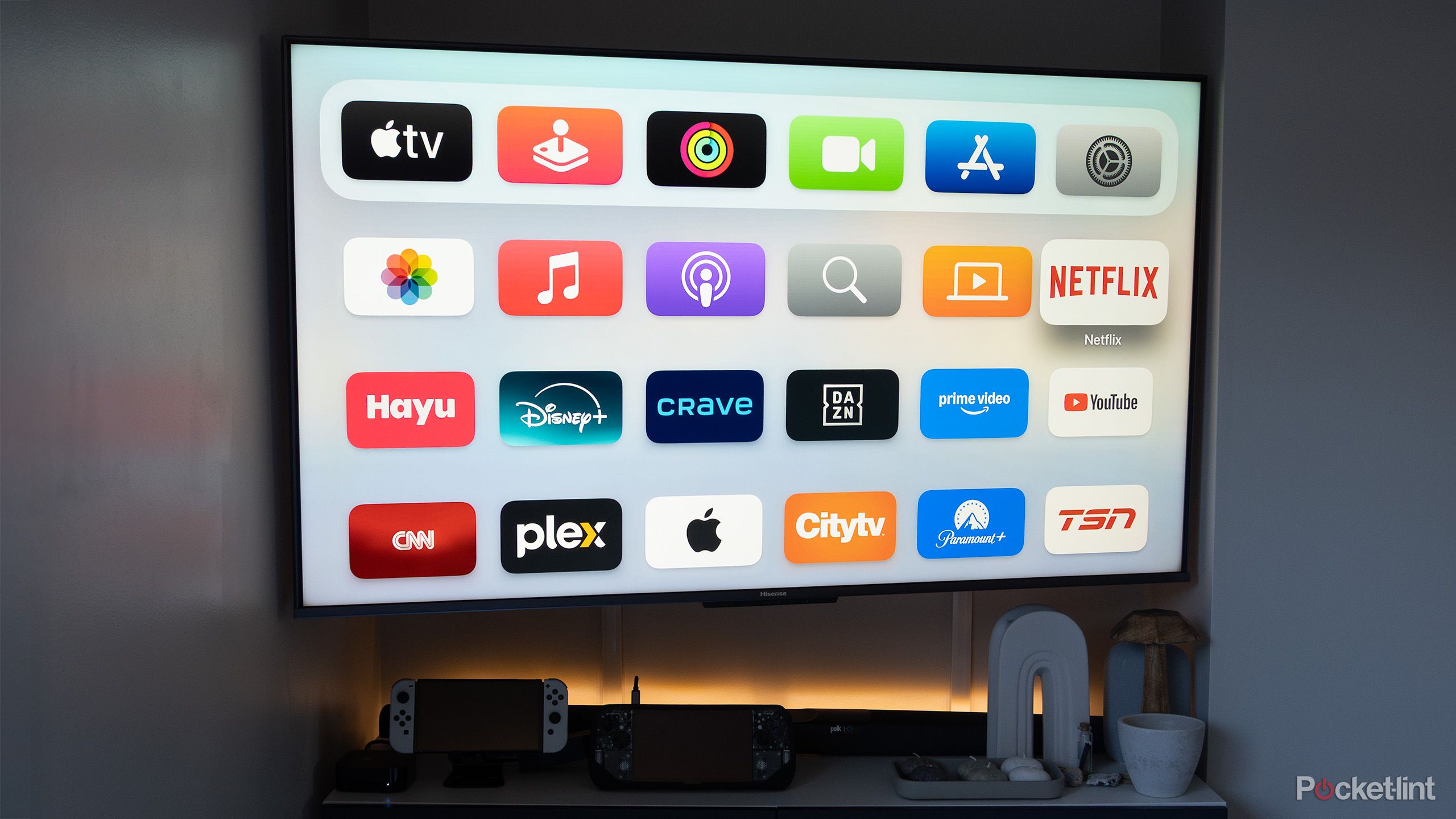 A Hisense U8H TV on the wall. 