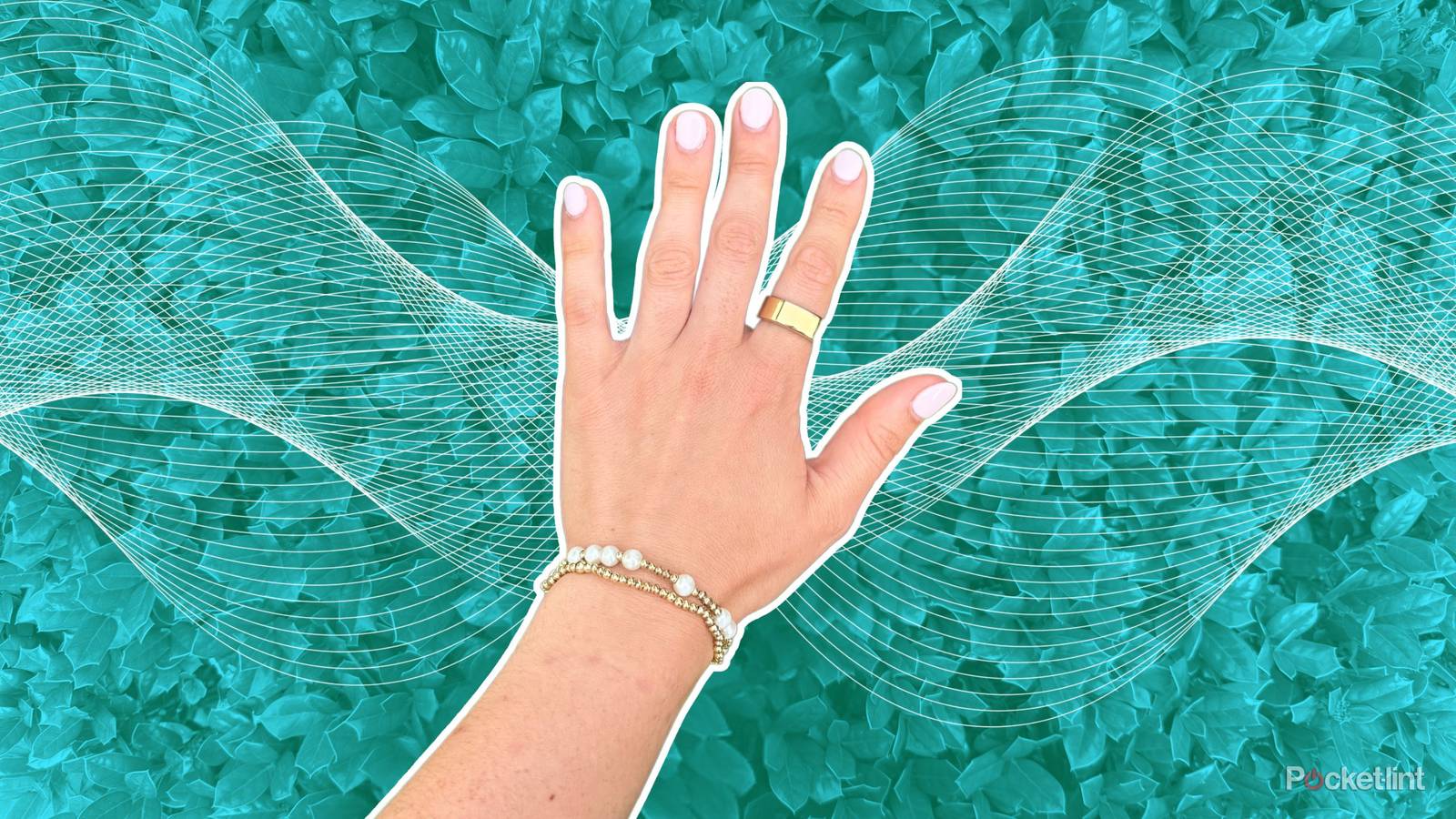 A hand with an Oura Ring on. 