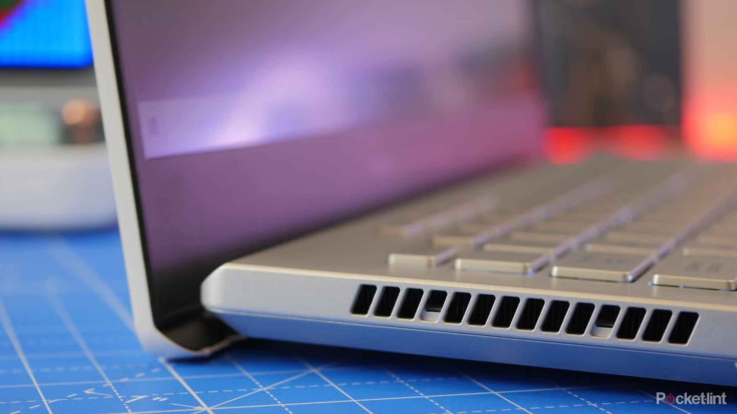 A side view of an ASUS G14 gaming laptop.