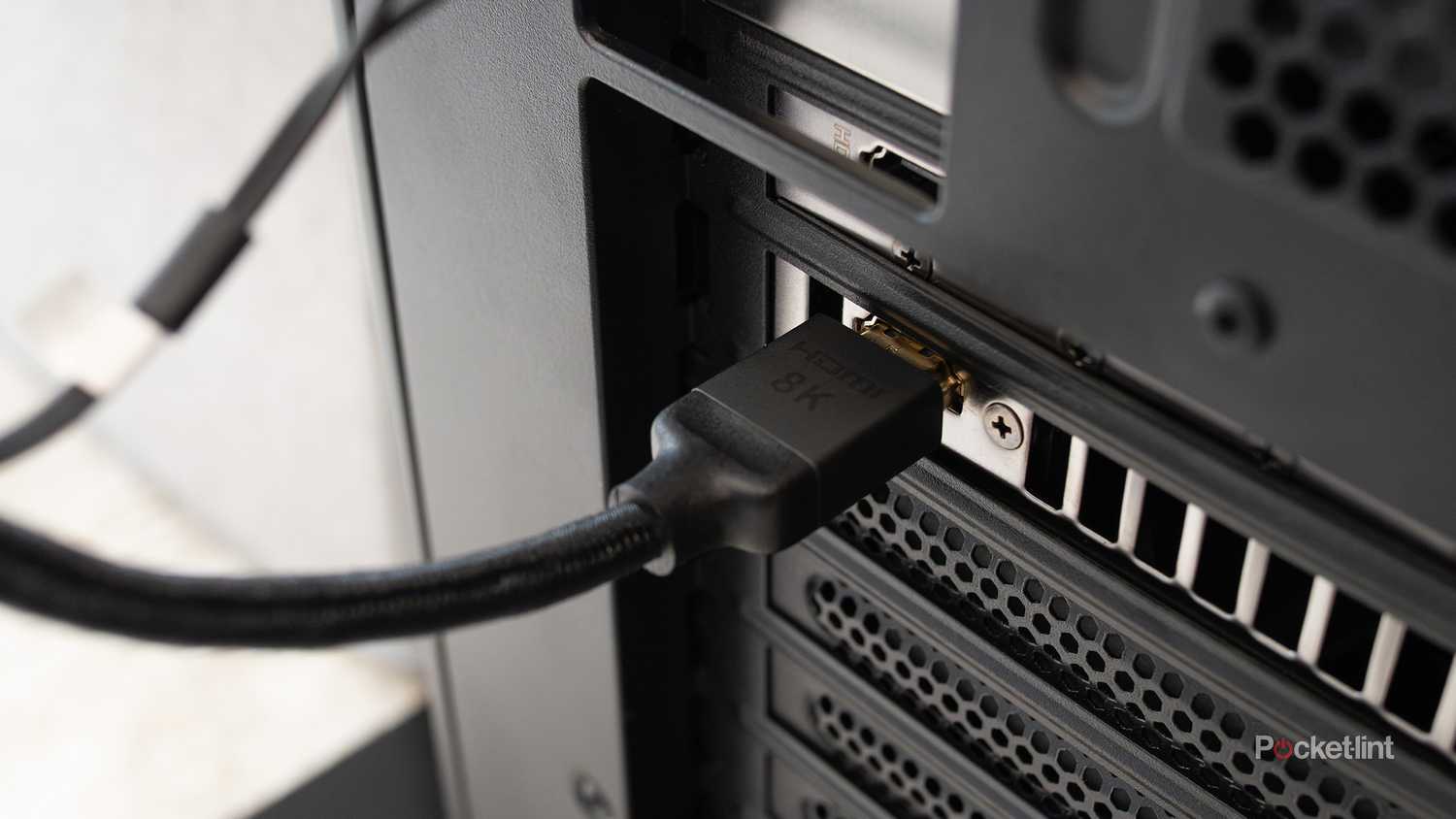A HDMI 2.1 cable plugged into a PC.
