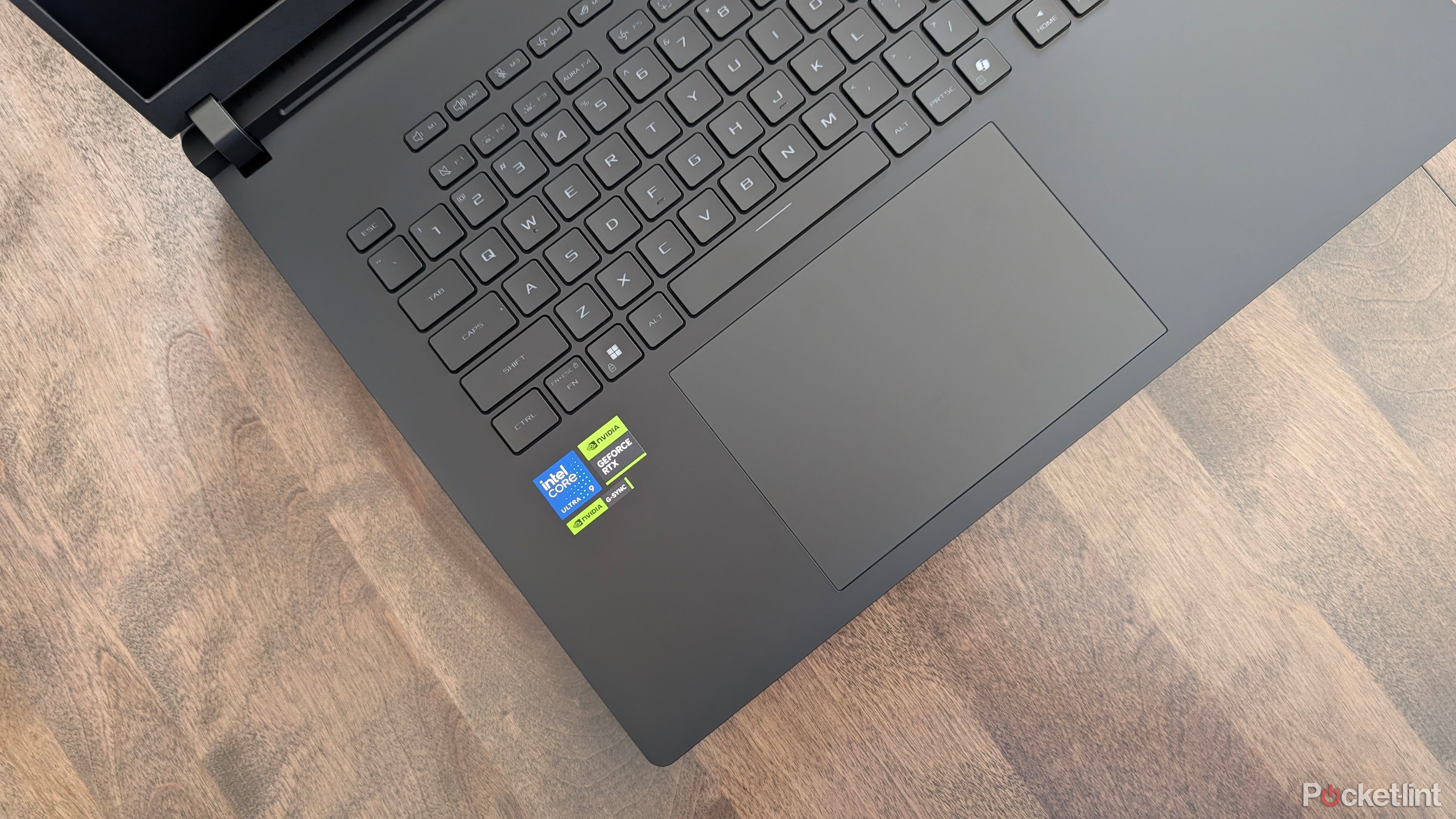 An Asus gaming laptop and keyboard. 