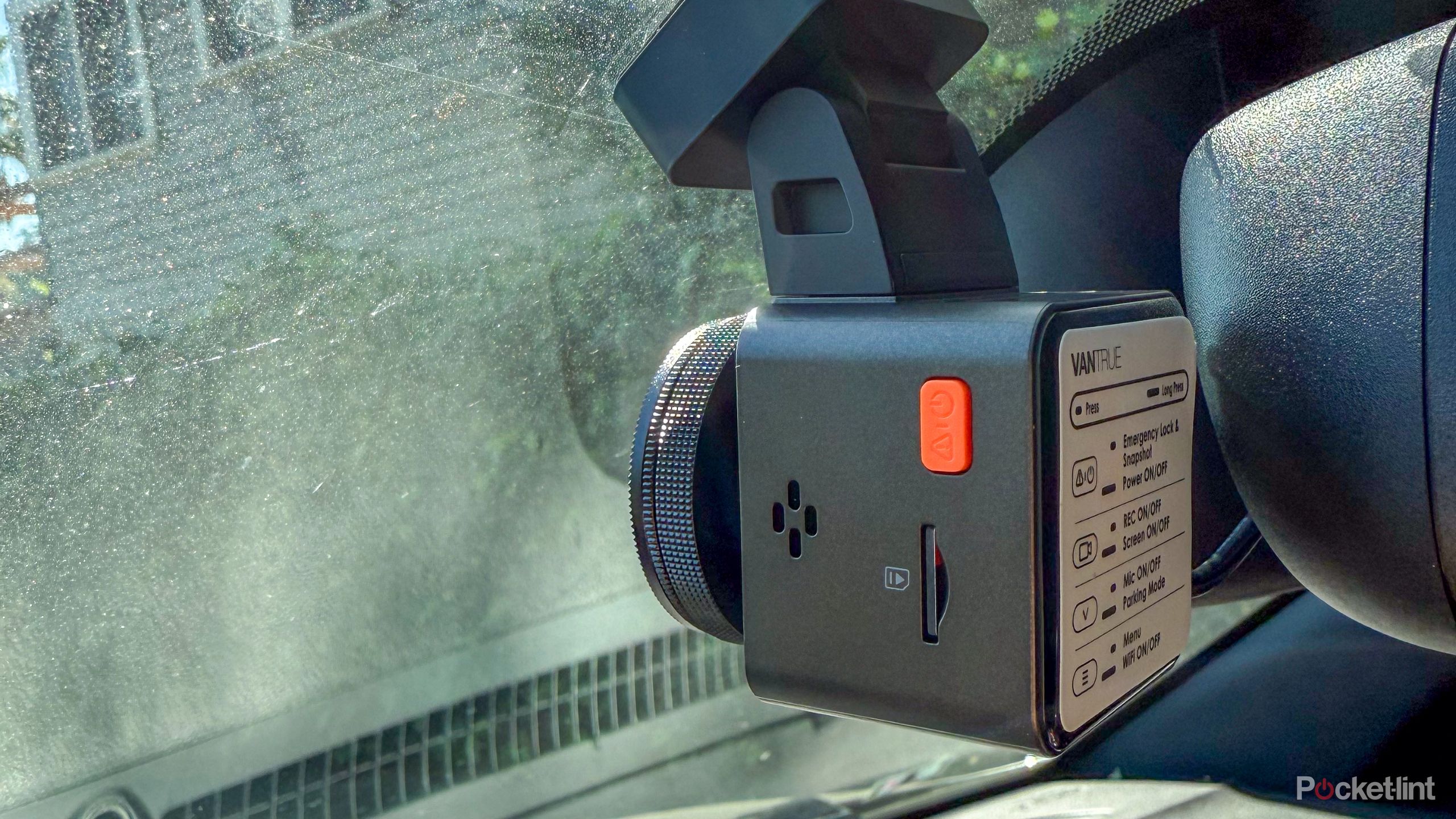 A photograph showing the side of the Vantrue E1 Pro and highlighting the microSD card slot.