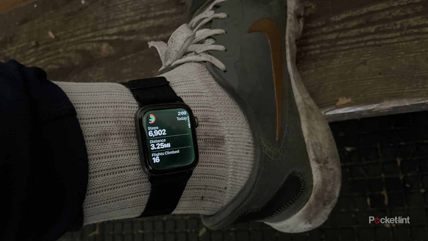 An Apple Watch around an ankle showing the steps of the day