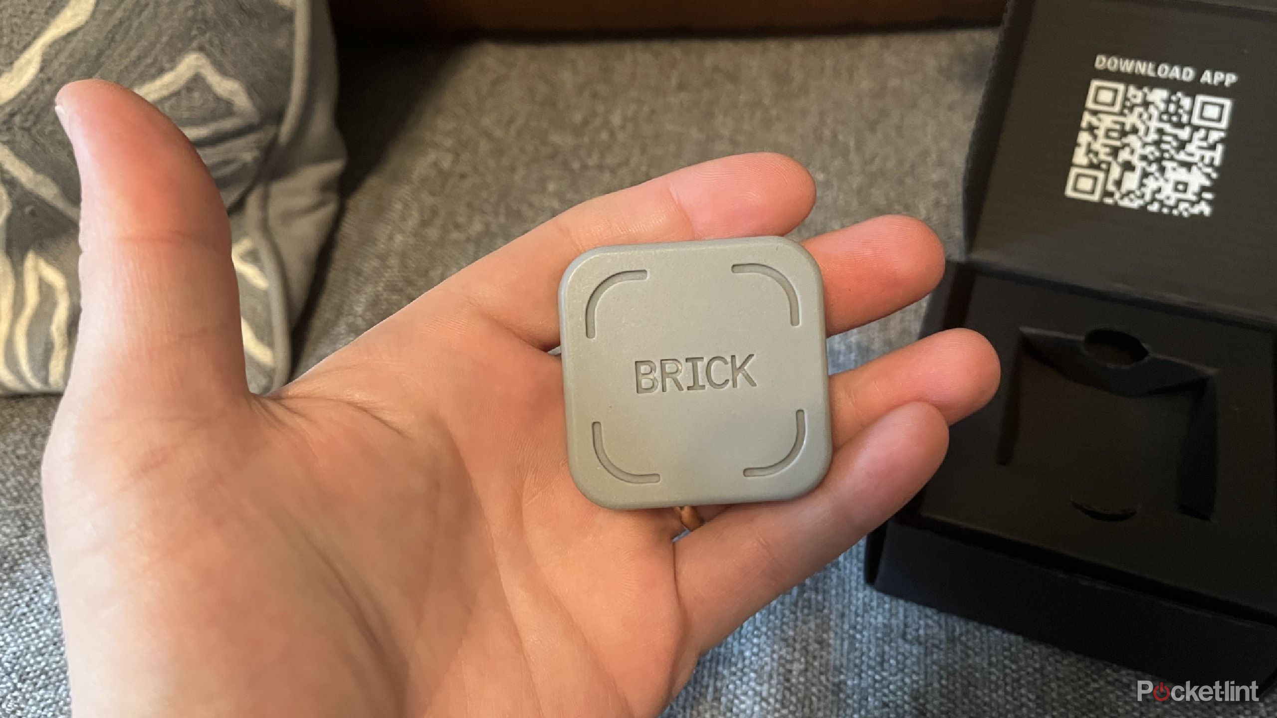 Ther Brick being held in a hand