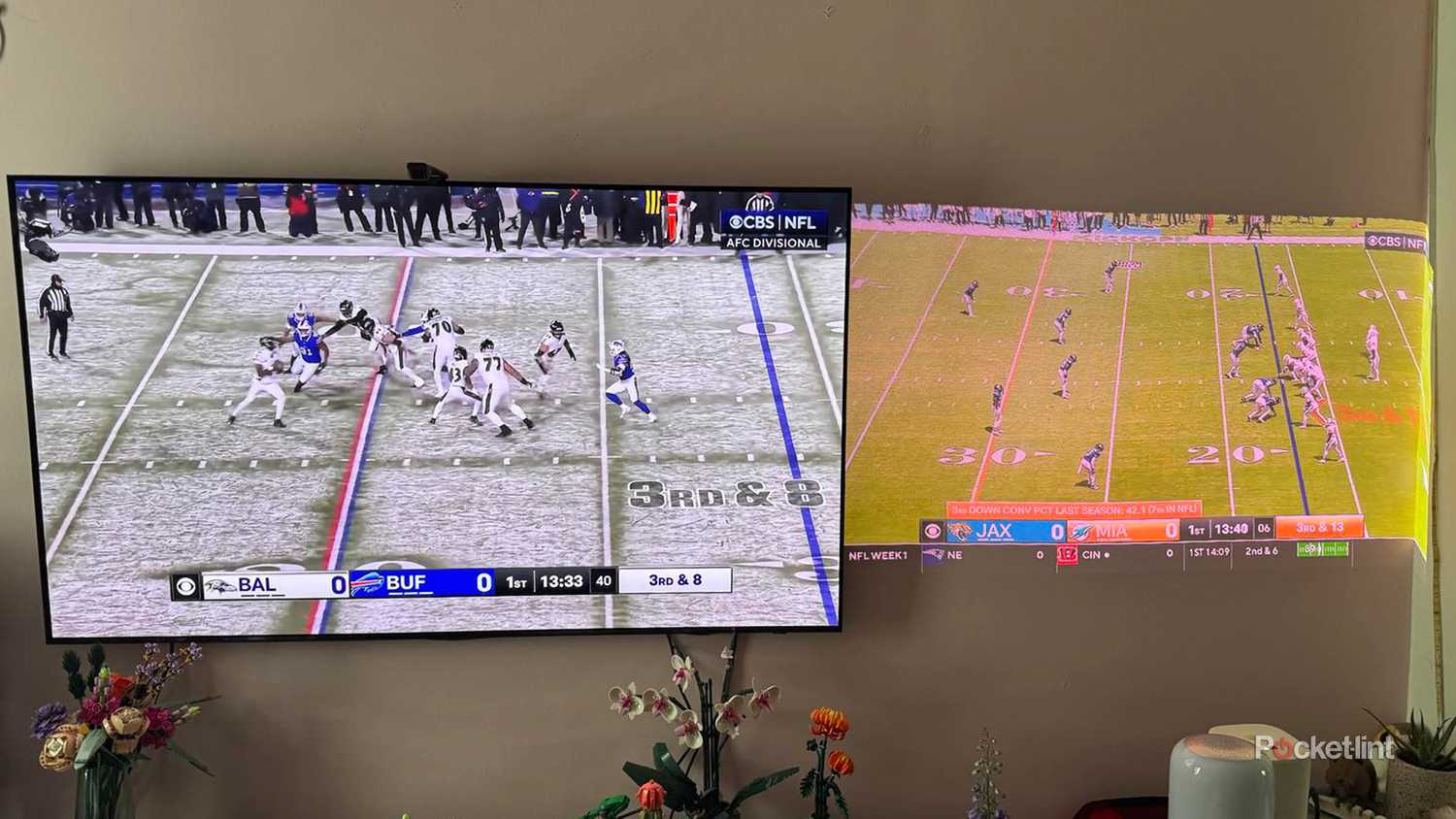 Two football games side by side, one on Samsung smart TV and one on Samsung Premiere 5 Projector