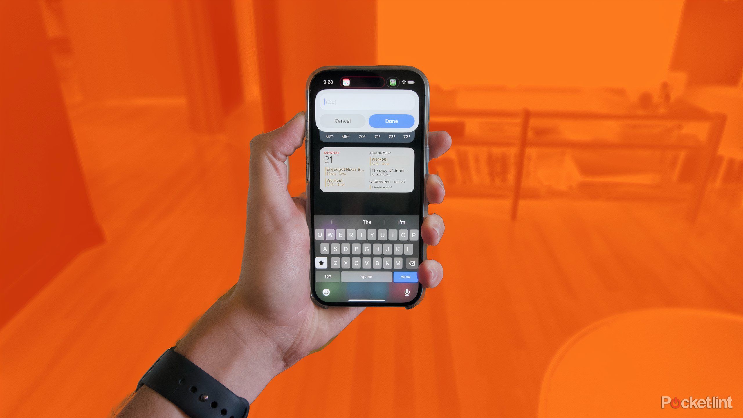 A hand holding an iPhone 16 running the Fantastical Action Button shortcut.
