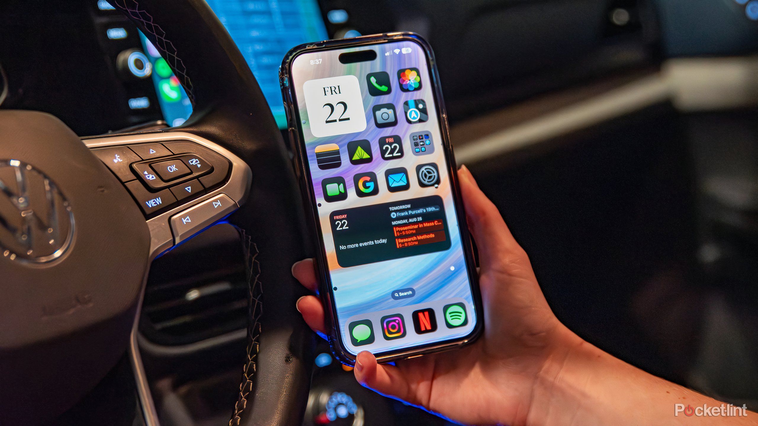 A still photo of vehicle motion cues active on an iPhone 15 Plus. 