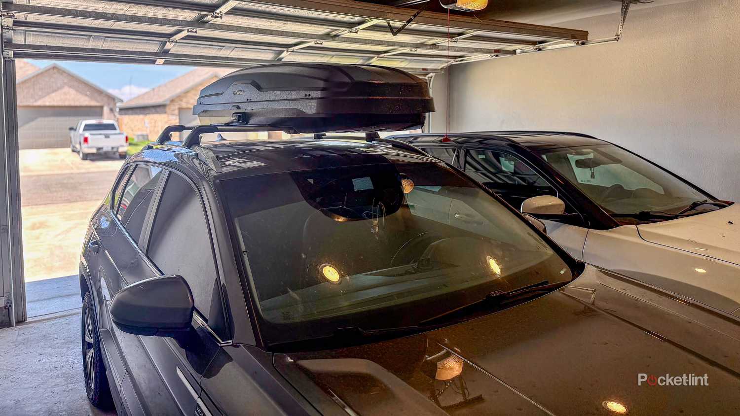 A still photo of a Yakima SkyBox Skinny on my 2022 Volkswagen Taos parked in my garage