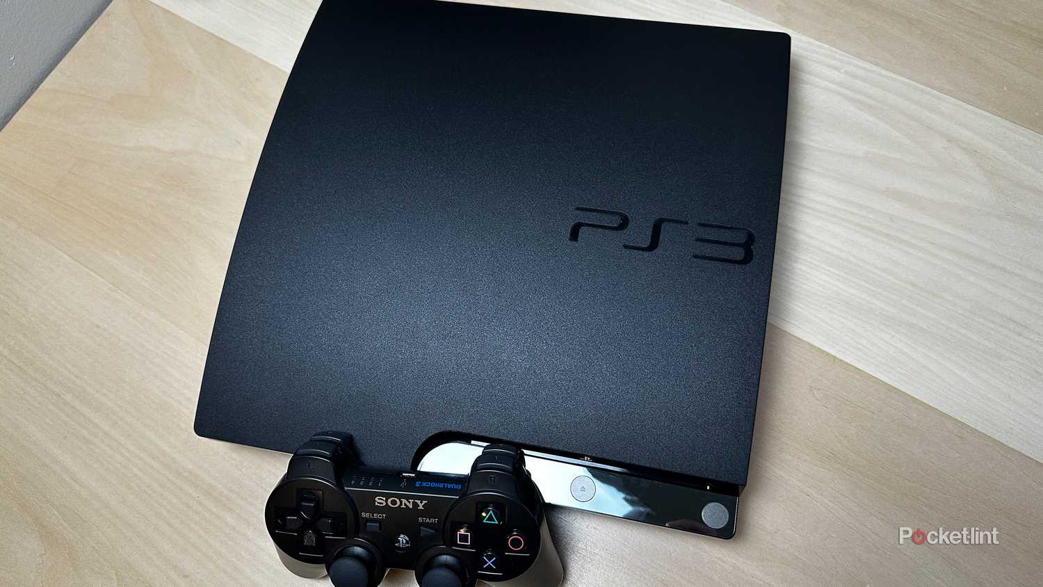 PS3 console with controller.