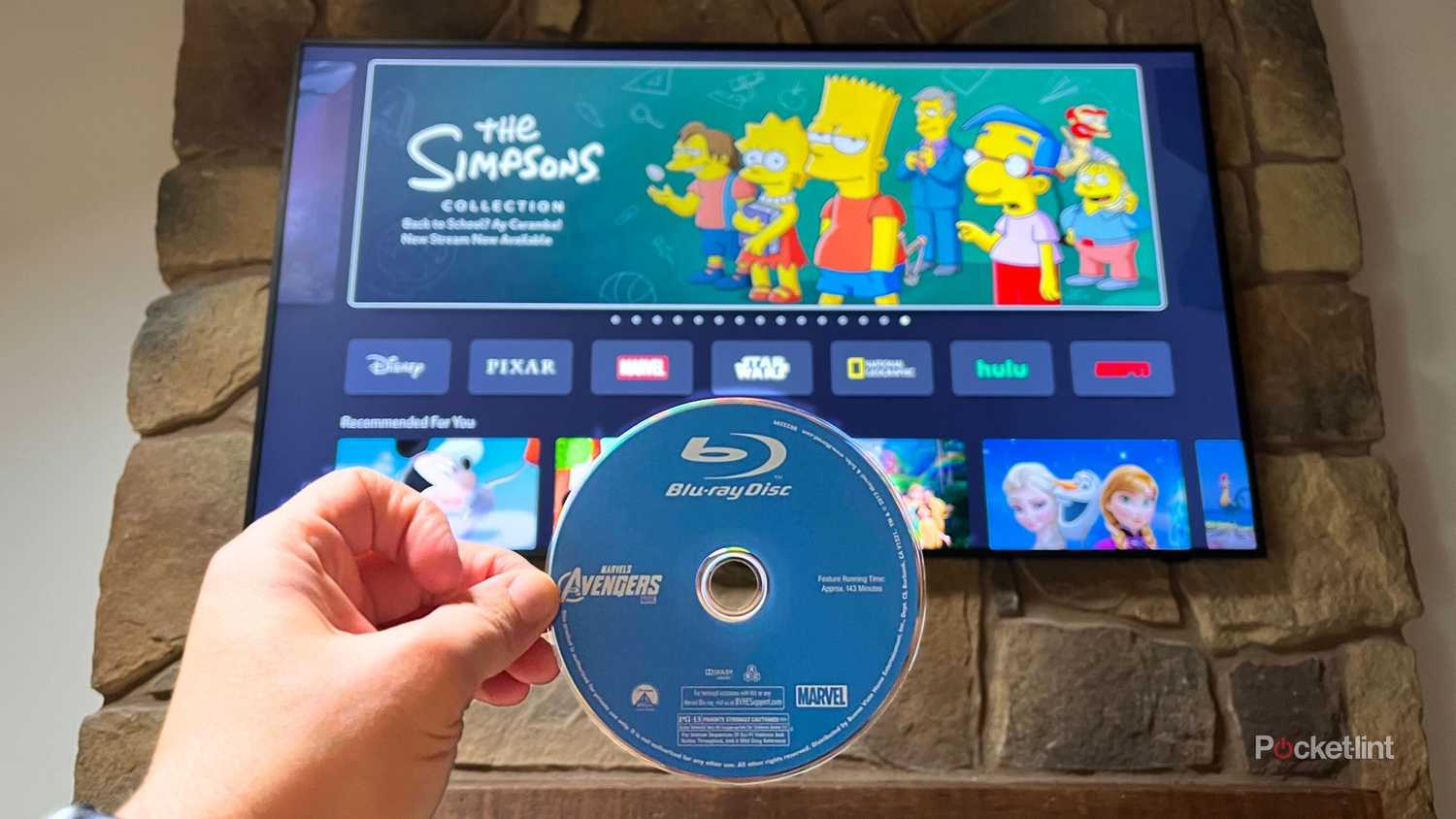 A Blu-Ray disc in front of The Simpsons on Disney+.