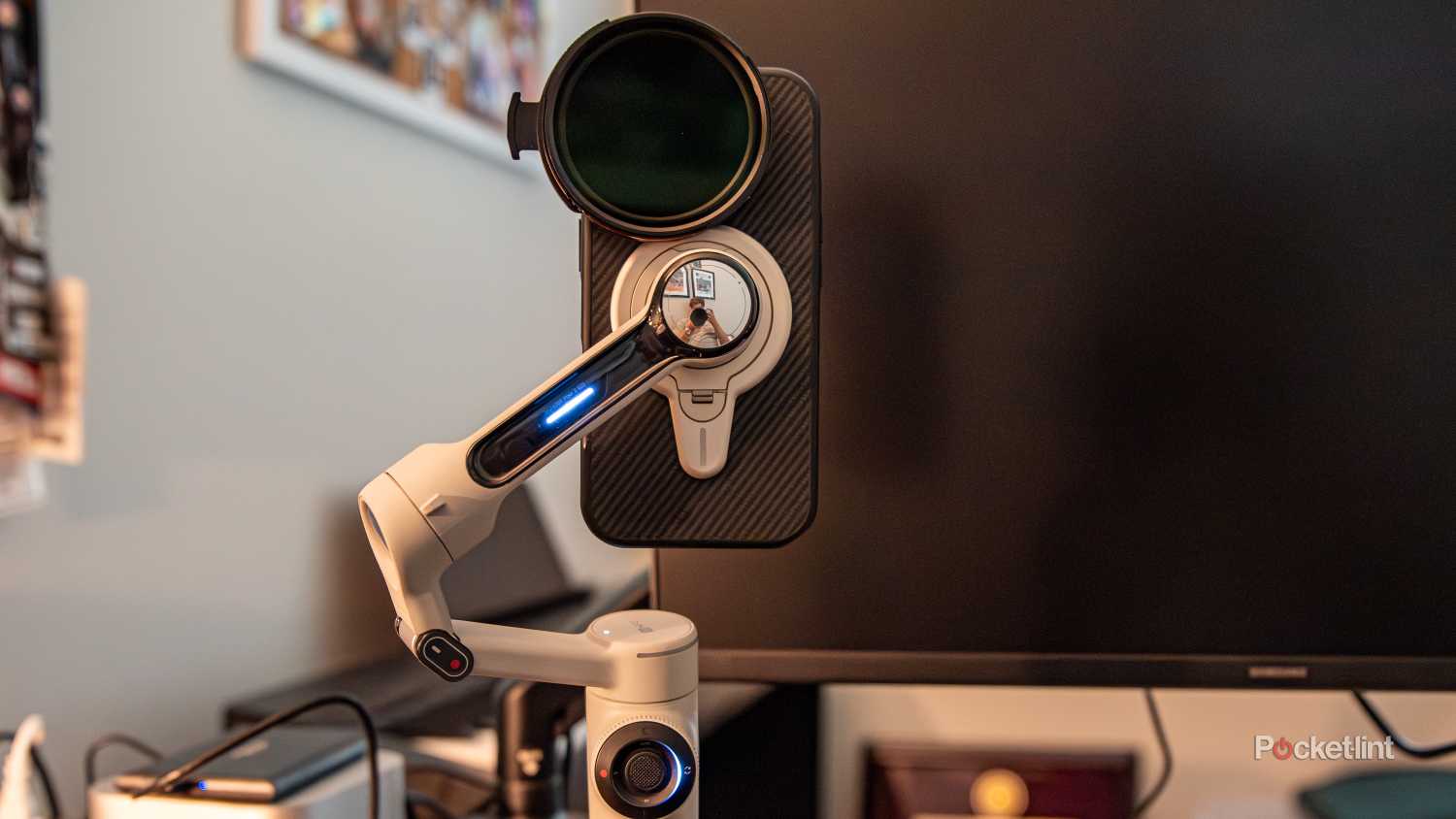 A still photo of the iPhone 16 Pro with a Freewell Hybrid Filter Kit mounted to an Insta360 Flow 2 Pro gimbal.