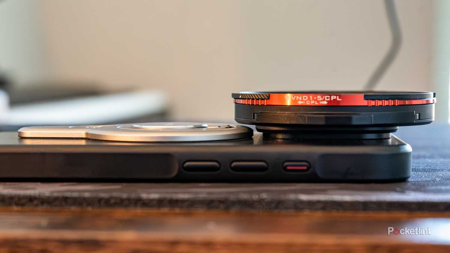 A still photo showcasing the gap from the between a gimbal mount and the back of the Freewell iPhone Pro Hybrid Filter.