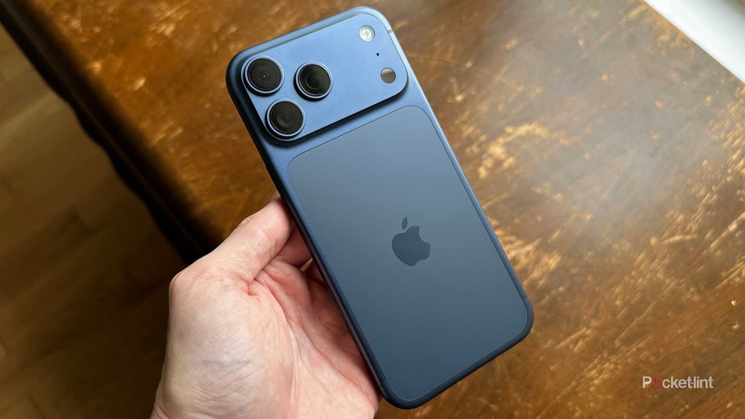 iPhone 17 Pro Max in deep blue.