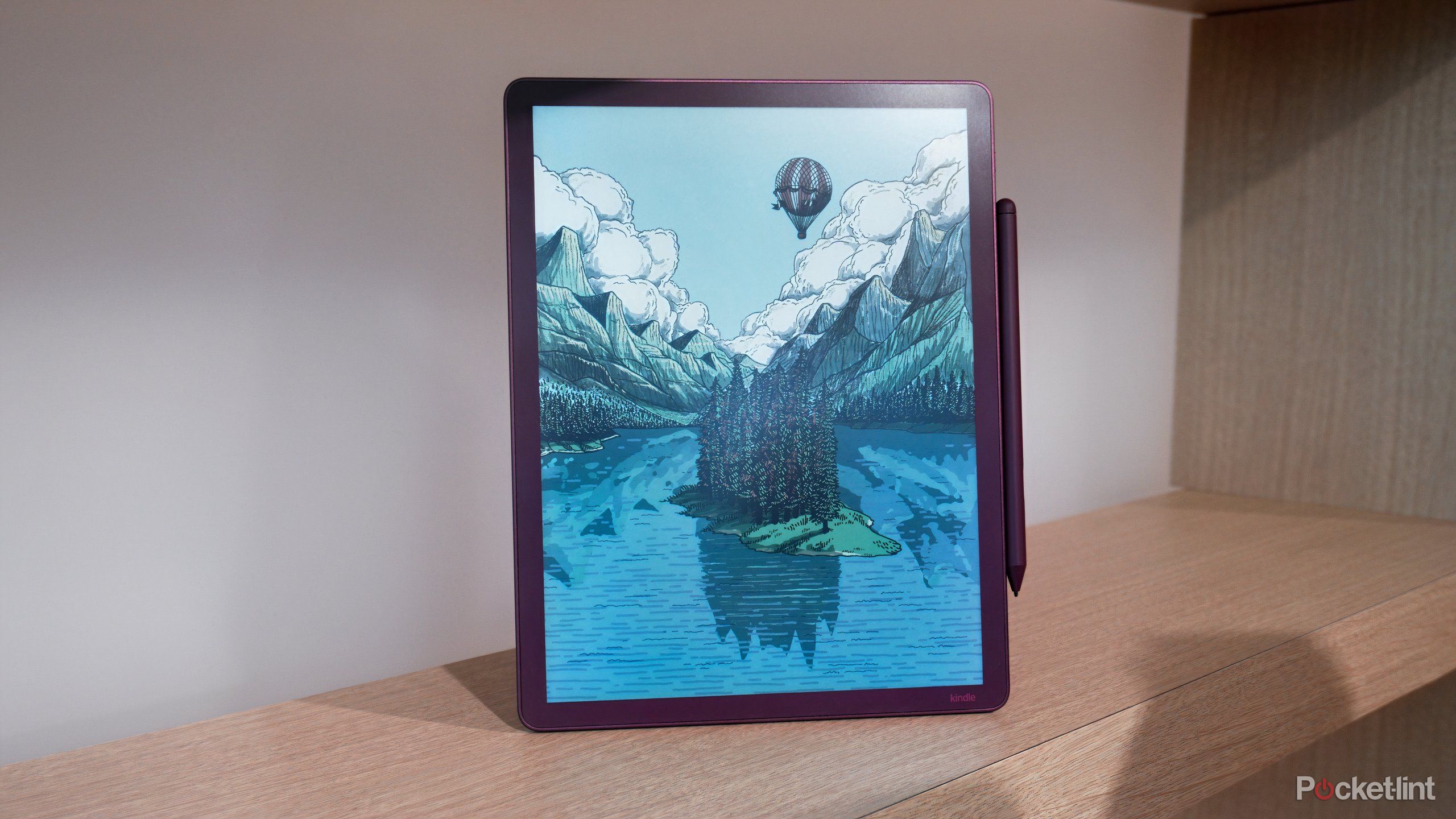 A purple Kindle Scribe Colorsoft on a shelf.