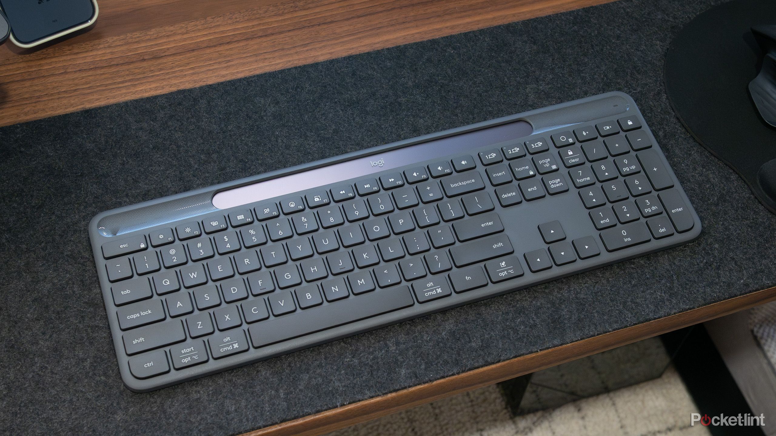 Logitech's Signature Slim Solar Plus K980 sitting on a desk 