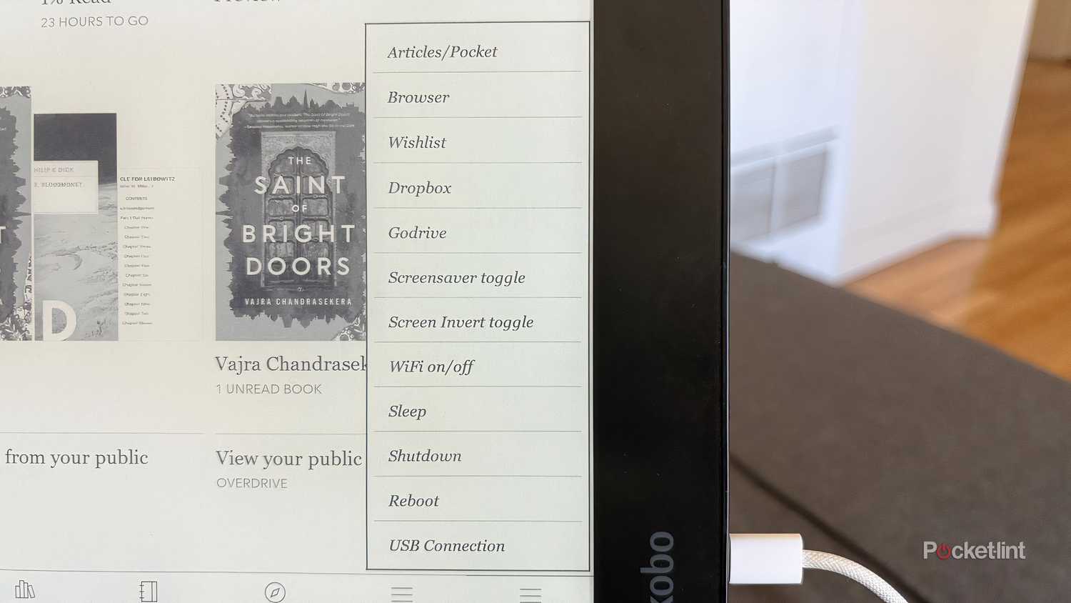 The bottom right corner of a Kobo Elipsa 2E displaying a custom NickelMenu of shortcuts.