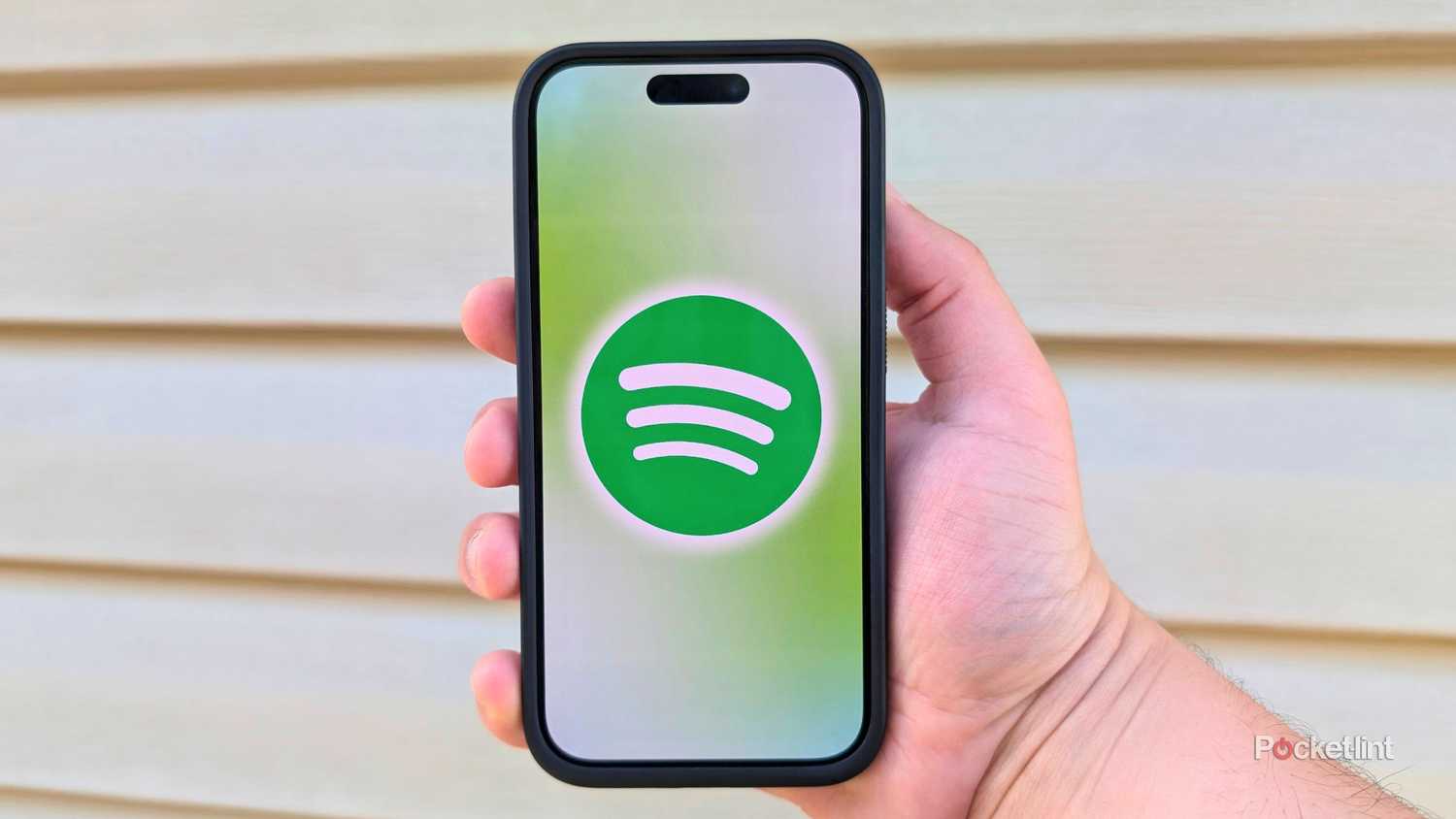 The Spotify logo on a smartphone. 