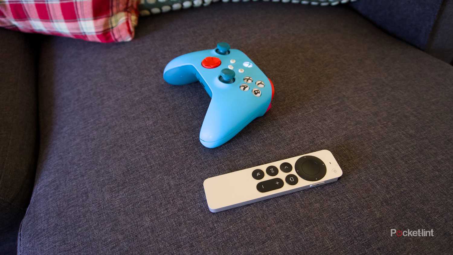 An Xbox wireless controller and a Siri Remote.