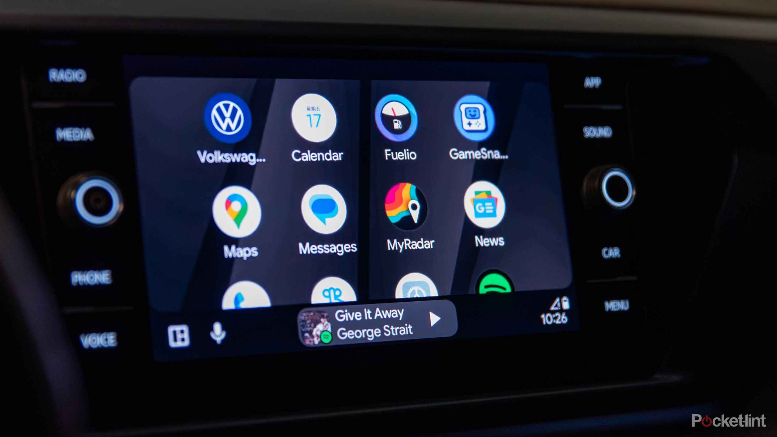 A still photo of the Android Auto app screen in dark mode. 