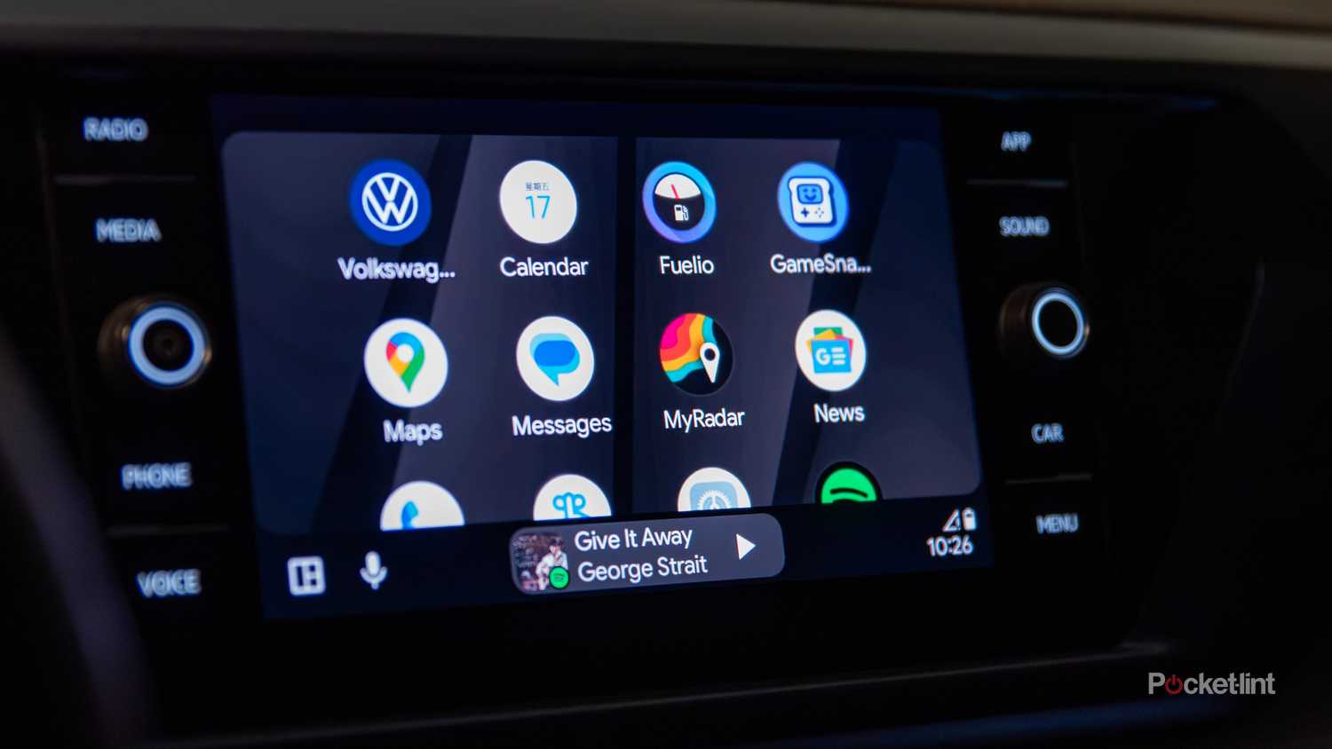 A still photo of the Android Auto app screen in dark mode. 