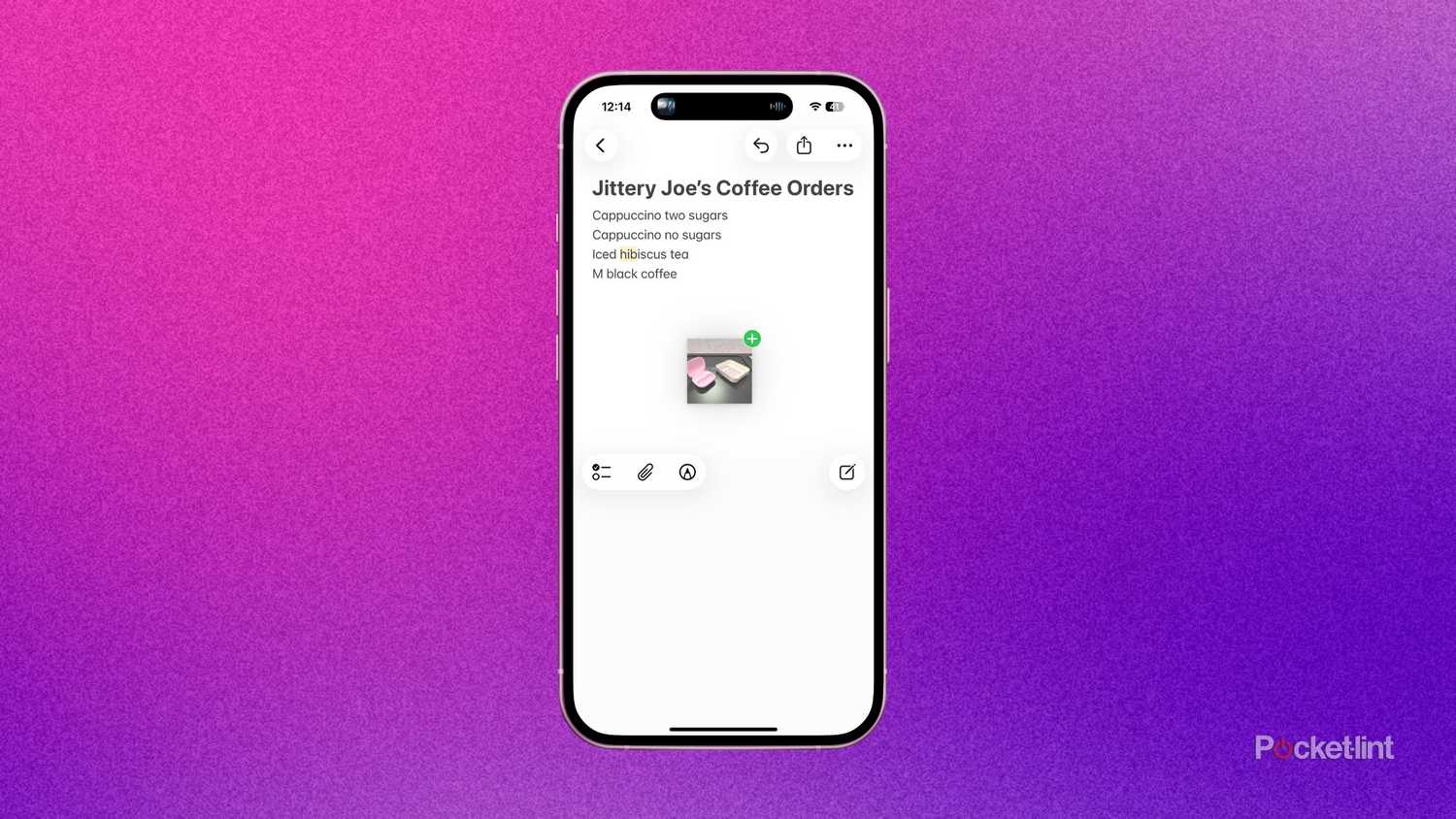 Dragging a photo into notes app on an iPhone.