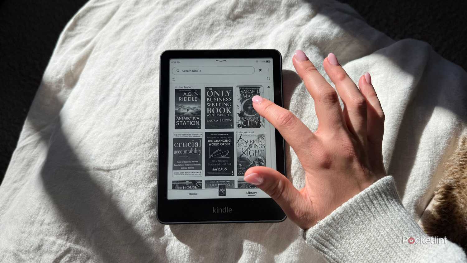 Tapping through a library on a kindle. 