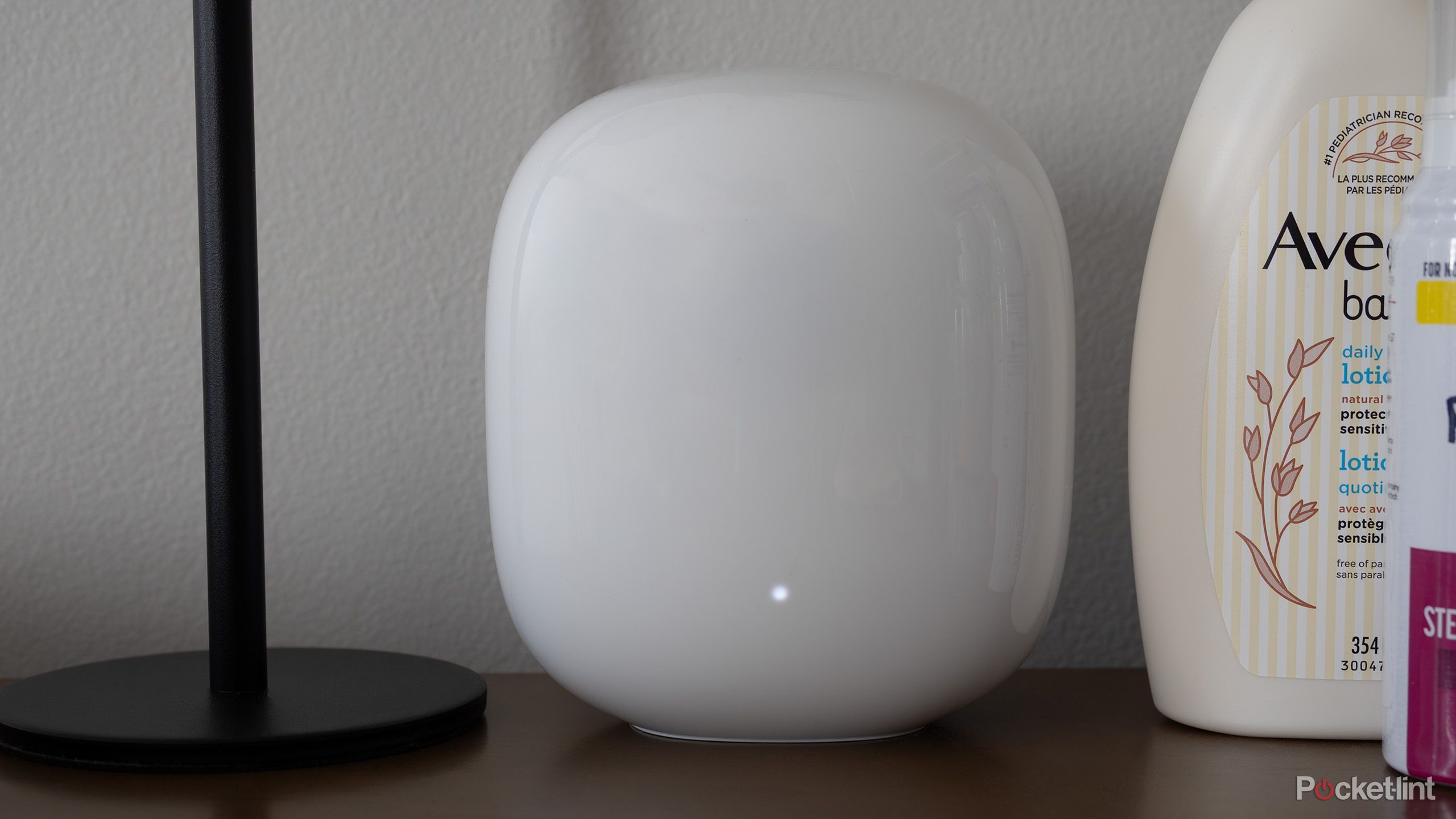 Google's Nest Wifi Pro sitting on a table