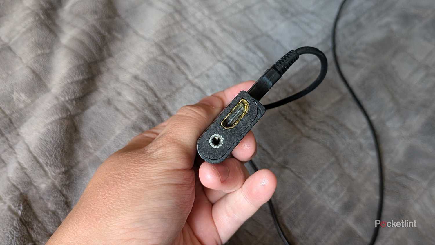 A top-down look at a PS2-to-HDMI adapter.