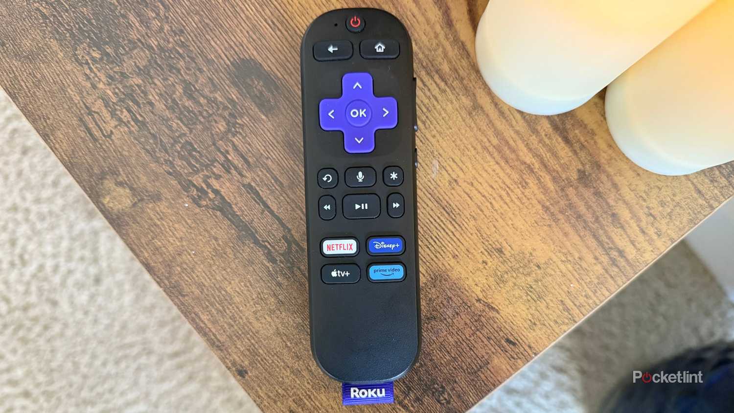 Roku remote on a table. 