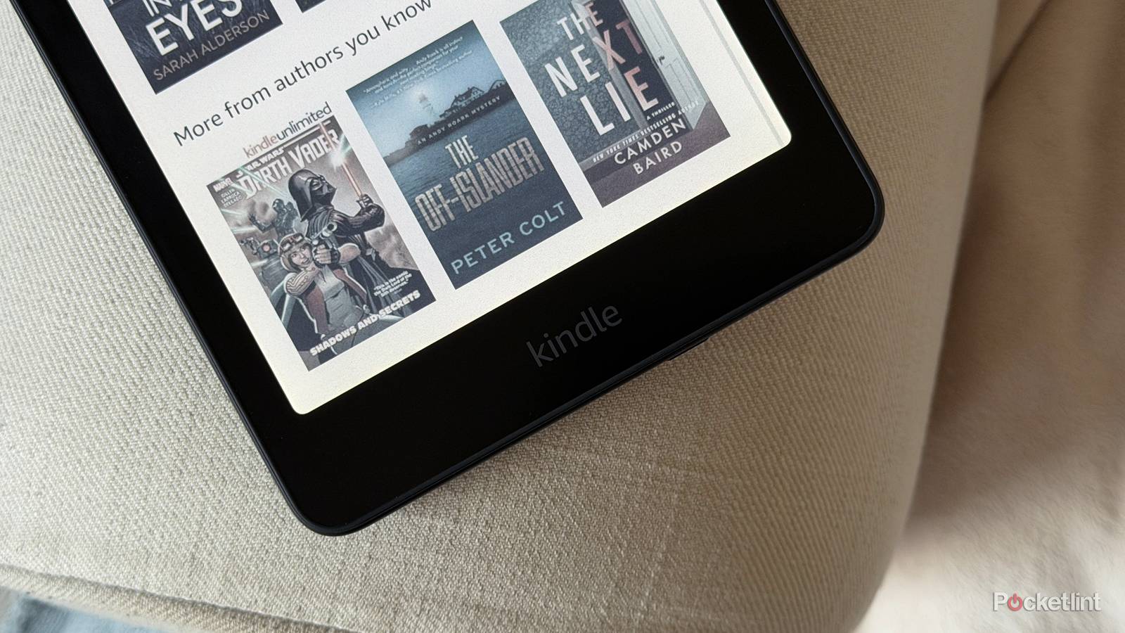 Kindle e-reader on a couch.