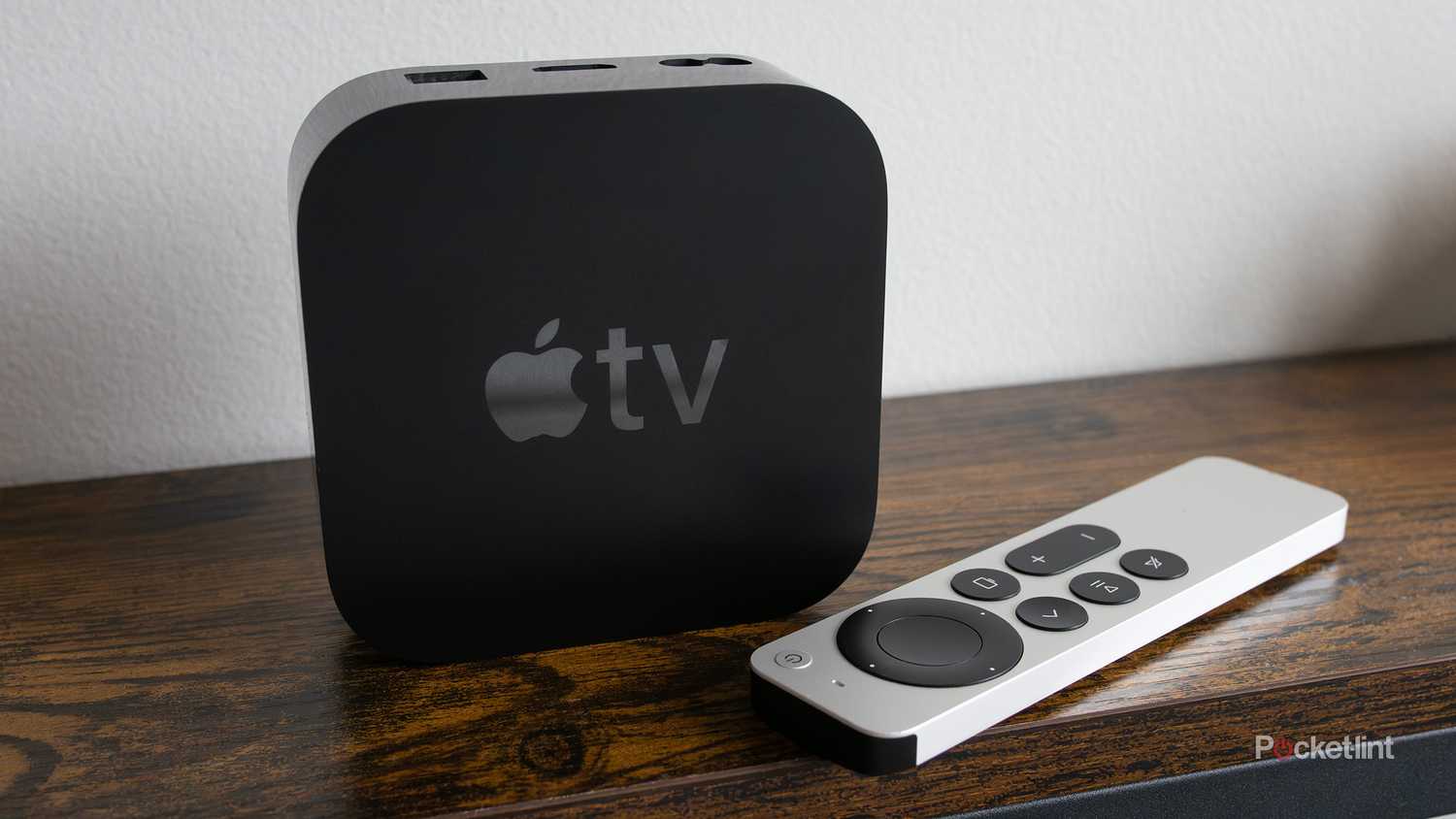 The Apple TV 4K sitting on a shelf.