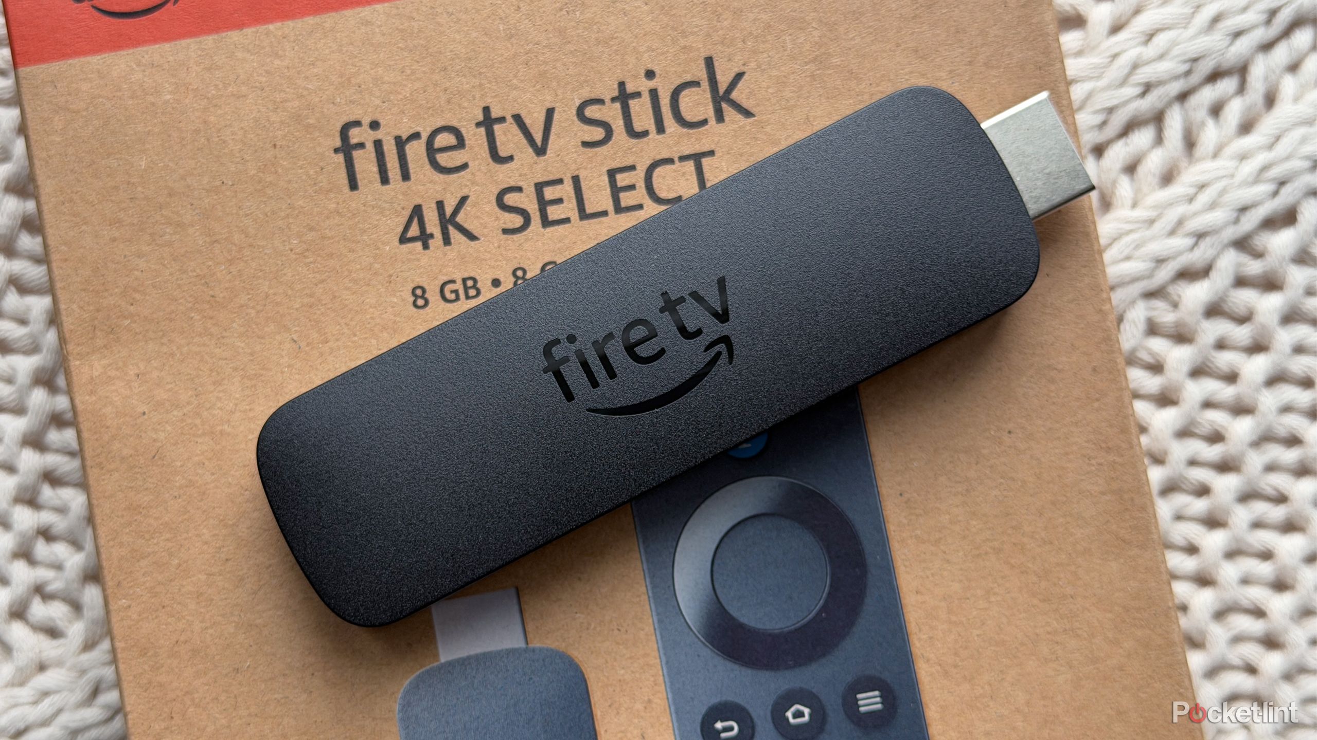 Fire TV Stick 4K Select on box.